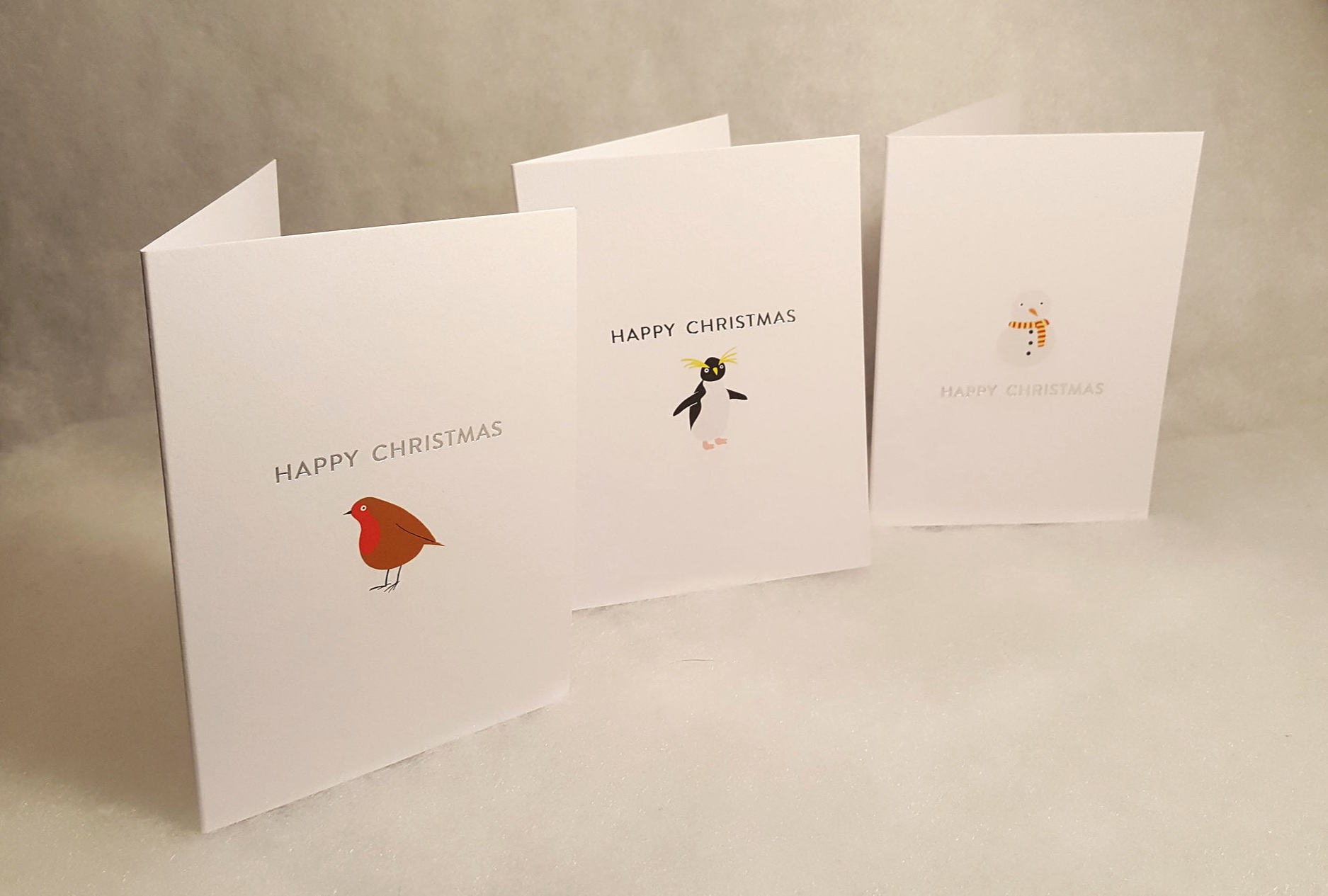 Silver foil printed Christmas cards with illustrations