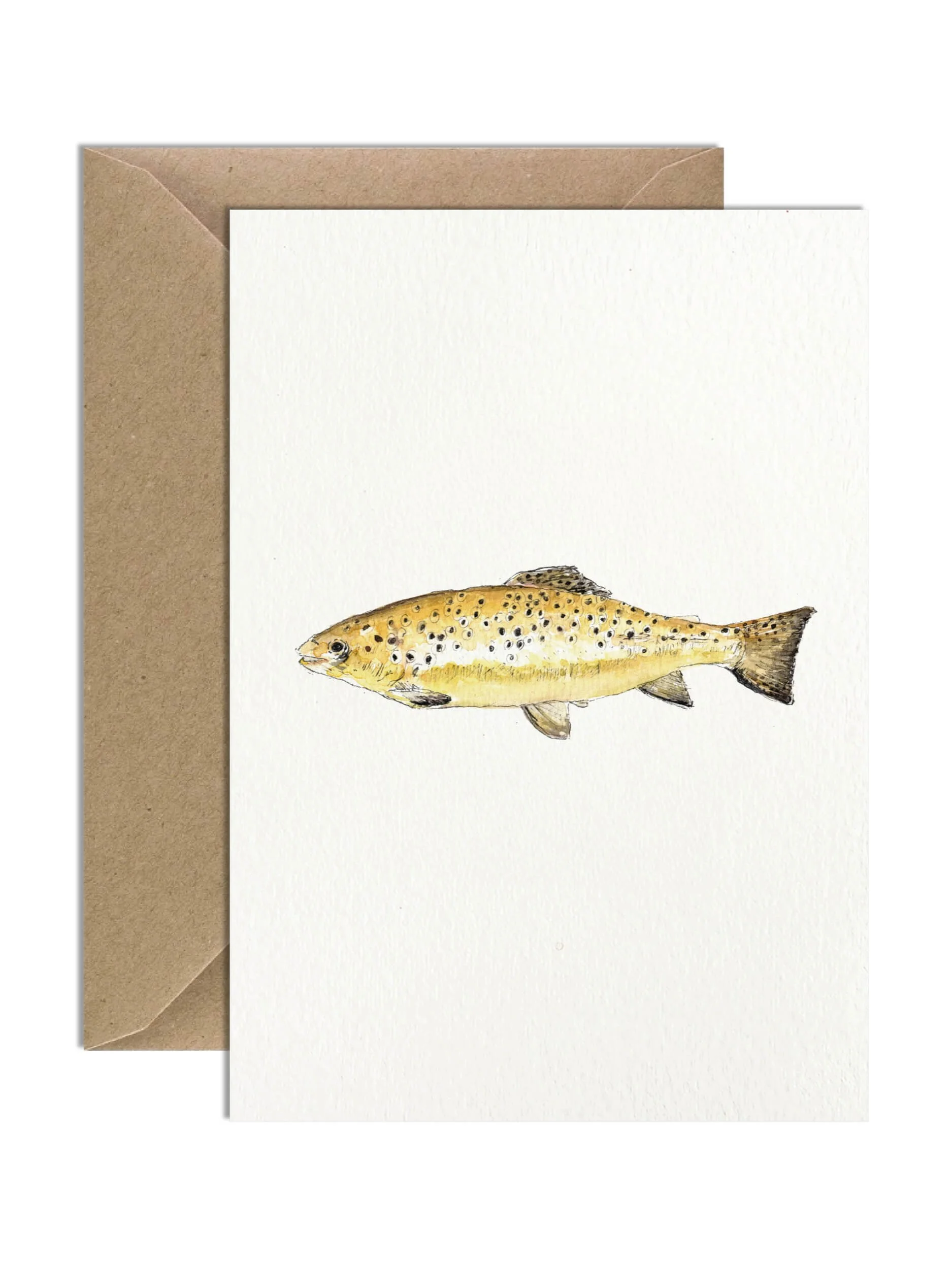 Watercolor illustration of a brown trout with golden hues and speckled patterns, centered on a white greeting card with a brown kraft envelope.