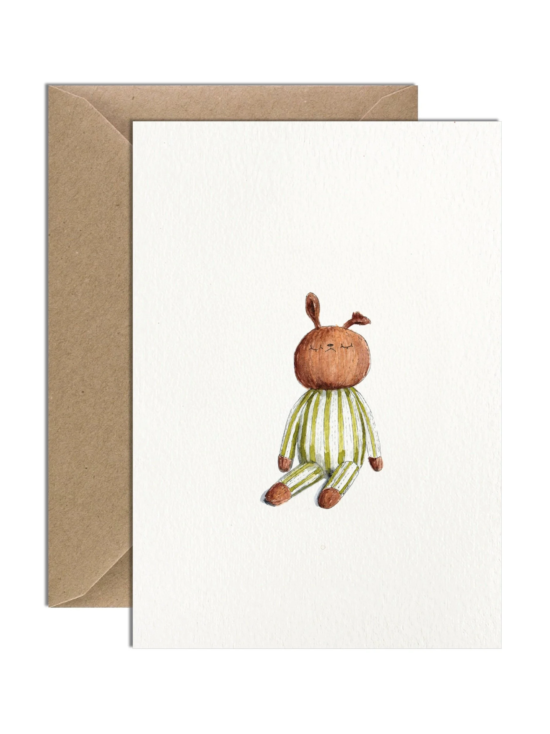A watercolour illustration on a greetings card depicting a handmade knitted bunny soft toy, dressed in a stripy light green and white outfit. There is a brown kraft envelope tucked behind.