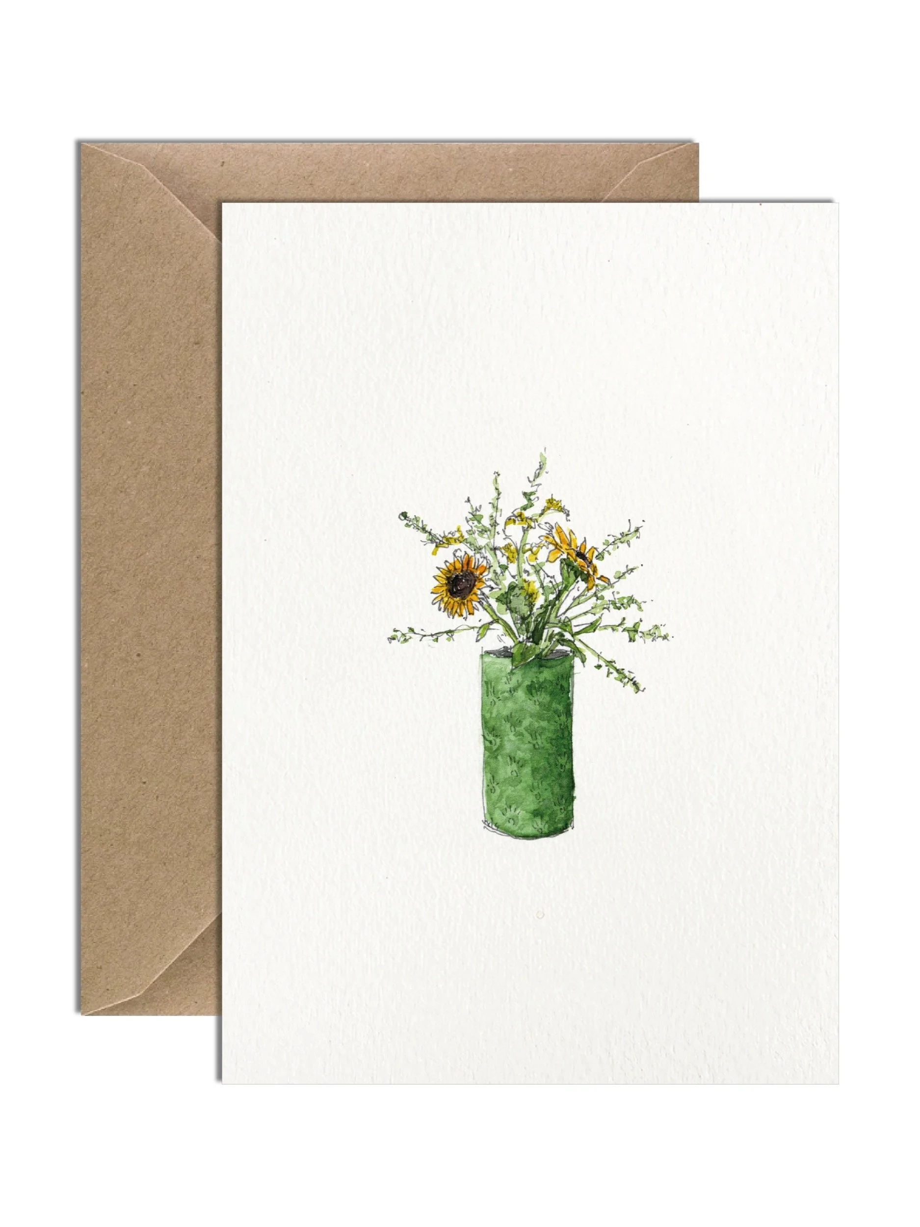 Beautiful yellow sunflowers sitting in a green textured ceramic vase with lots of green foliage too. The card is on an off white lightly textured card with a brown kraft envelope behind.