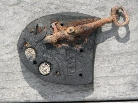 Heel with a Key Nailed to It