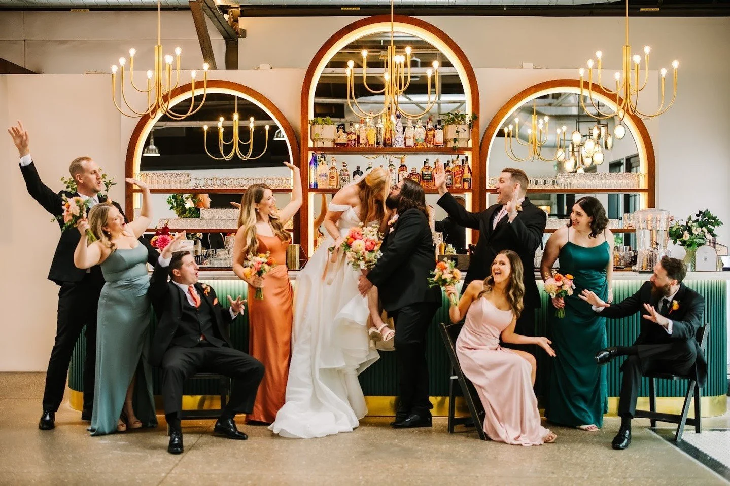 That moment of &ldquo;just married&rdquo; joy 🥂 The bar is open, the party is on.⁠
⁠
⁠
Photographer: @oandbphotoco⁠
Florist: @daffodilparker⁠
⁠
⁠
#madisonweddingvenue #wivenue #madisonweddingphotographer #madisonwedding #bridalparty ⁠