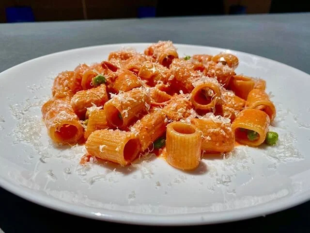 Spicy Mezze Meniche “Alla Vodka” with Peas and Prosciutto coming soon to the Mina Family Kitchen menu.