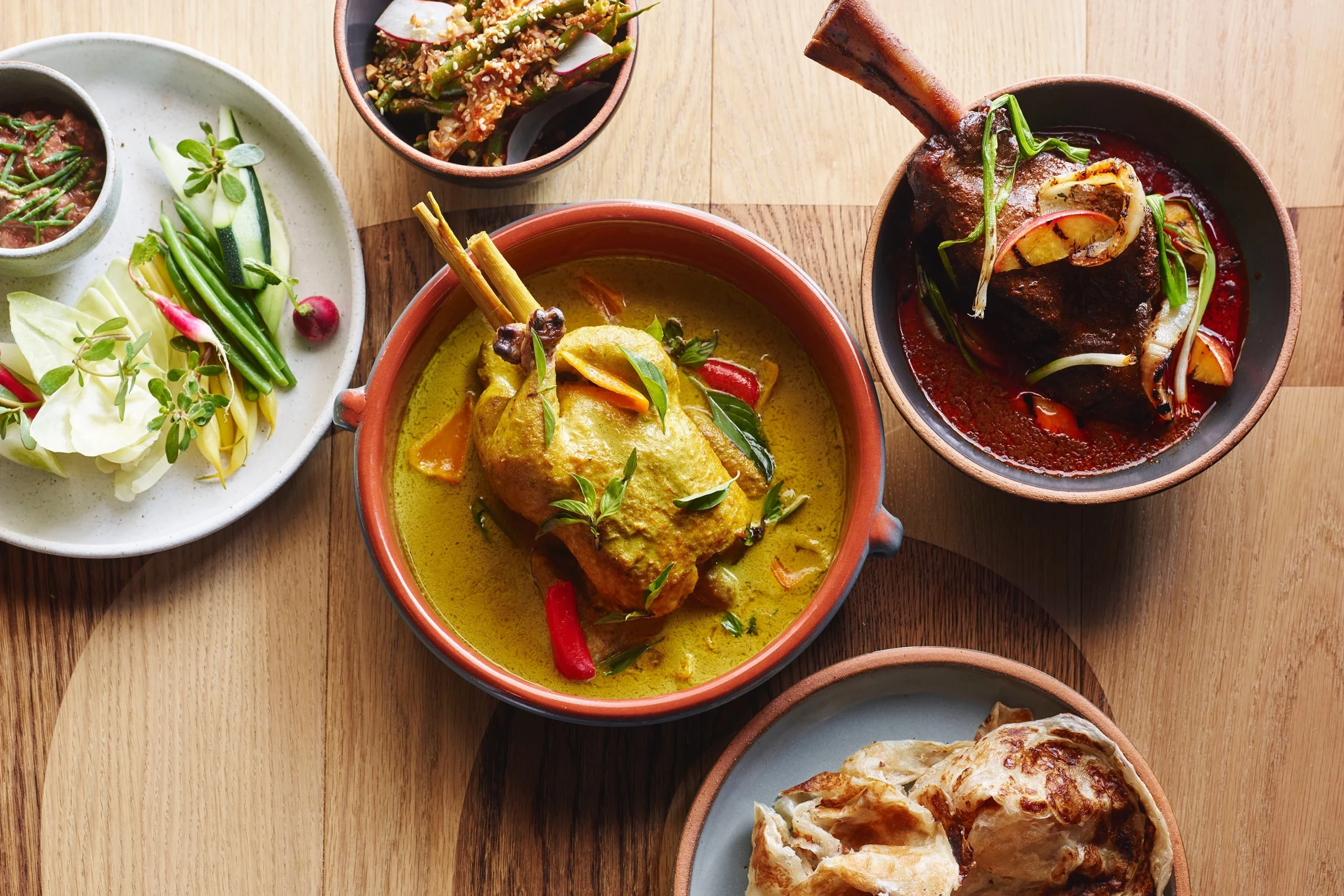 chicken_in_curry_plated_in_terracotta_bowl.jpg