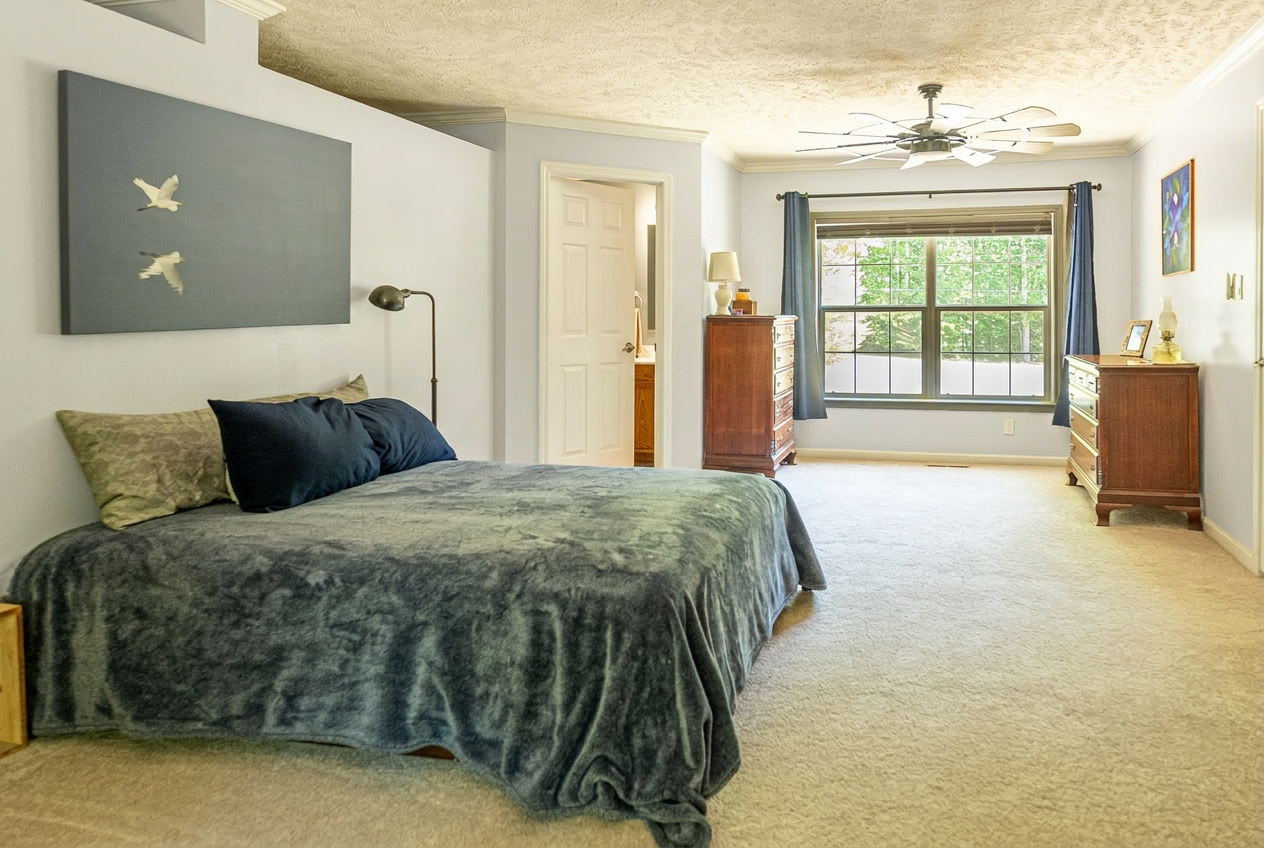 001_This_serene_bedroom_features_a_plush_blue_CCx2eTel.png