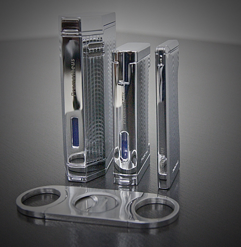 Prometheus Retro is the thinnest torch flame lighter. Shown with Prometheus Magma T (left), Ultimo X and Cutter D