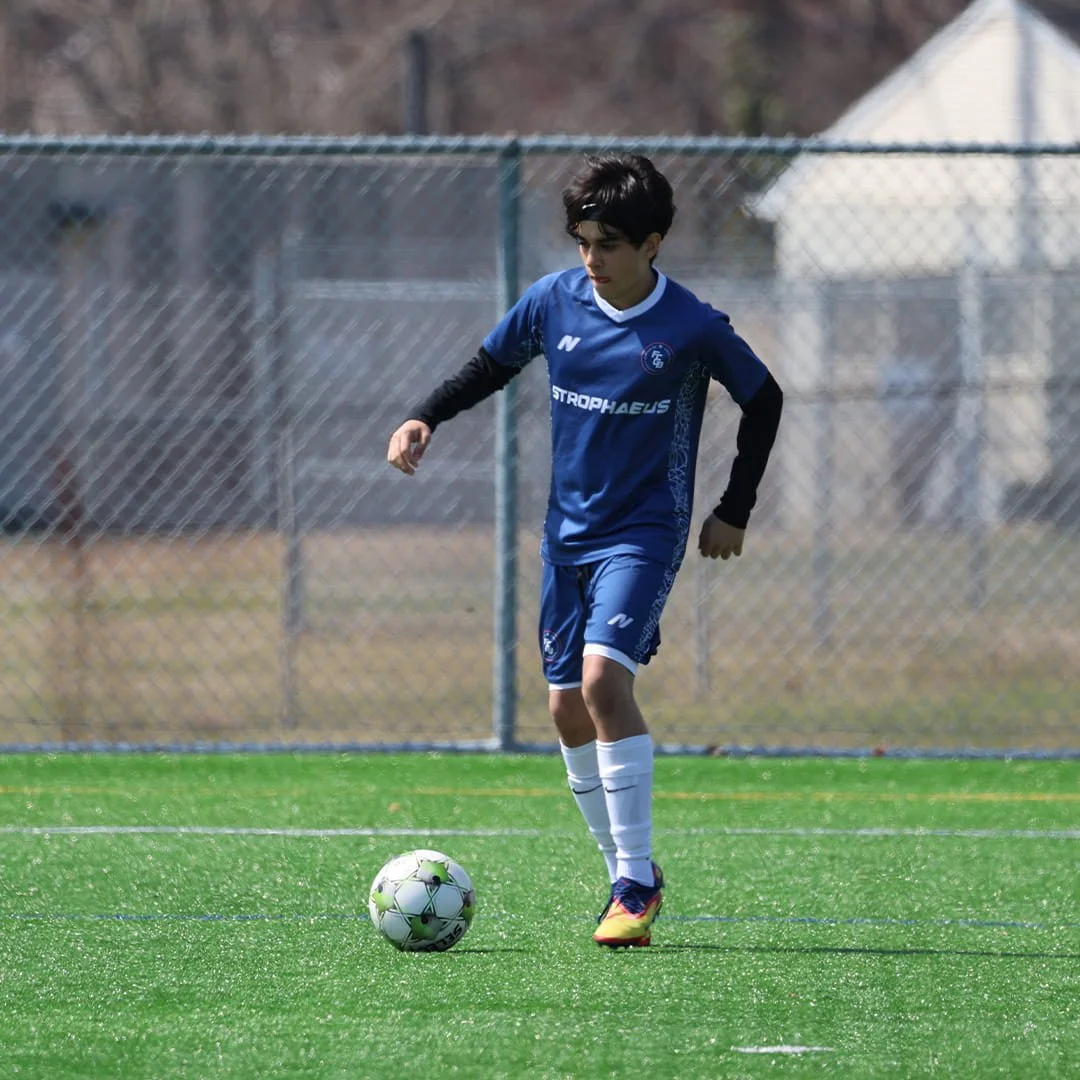 FCGB Soccer Academy possession-based soccer style with players using short passes and team structure