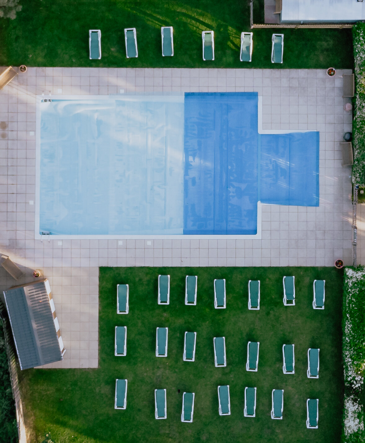 Drone shot of swimming pool at Swiss Farm Campsite in Henley