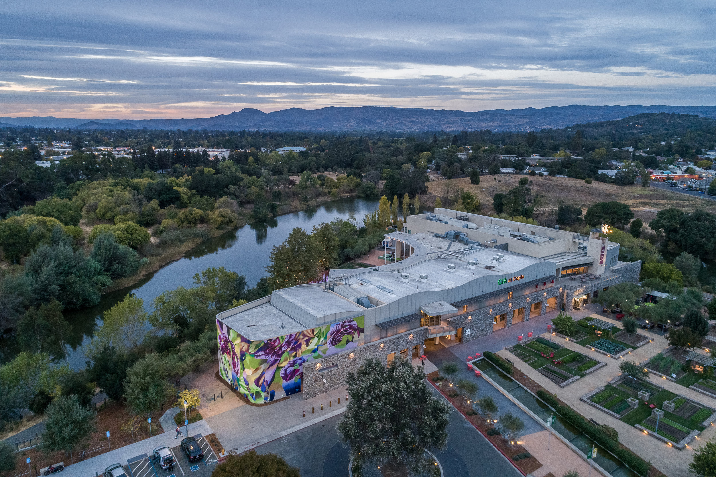 A bird's eye view of The Culinary Institute of America at Copia, located in Napa's Oxbow District, surrounded by the Napa River