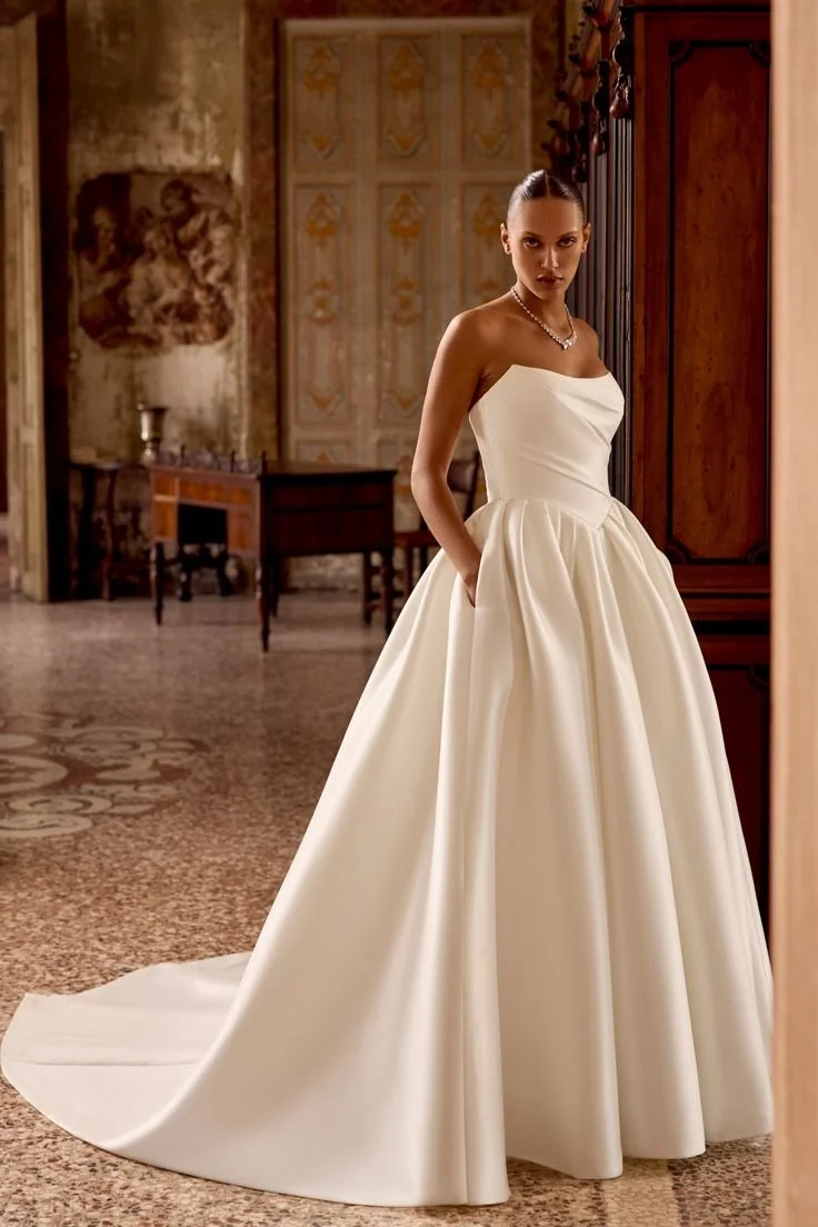 Justin Alexander 88436 Kelsey Ivory Sizes 14 & 24 (1).jpg