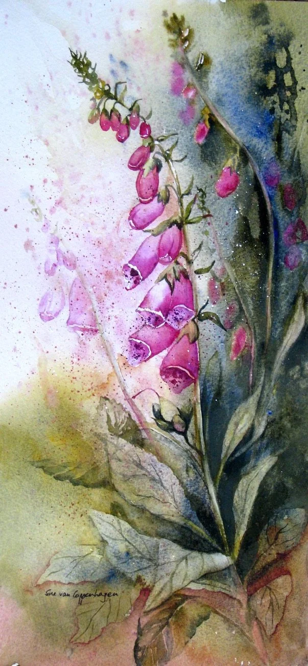Magenta foxglove against a warm green background with leaves