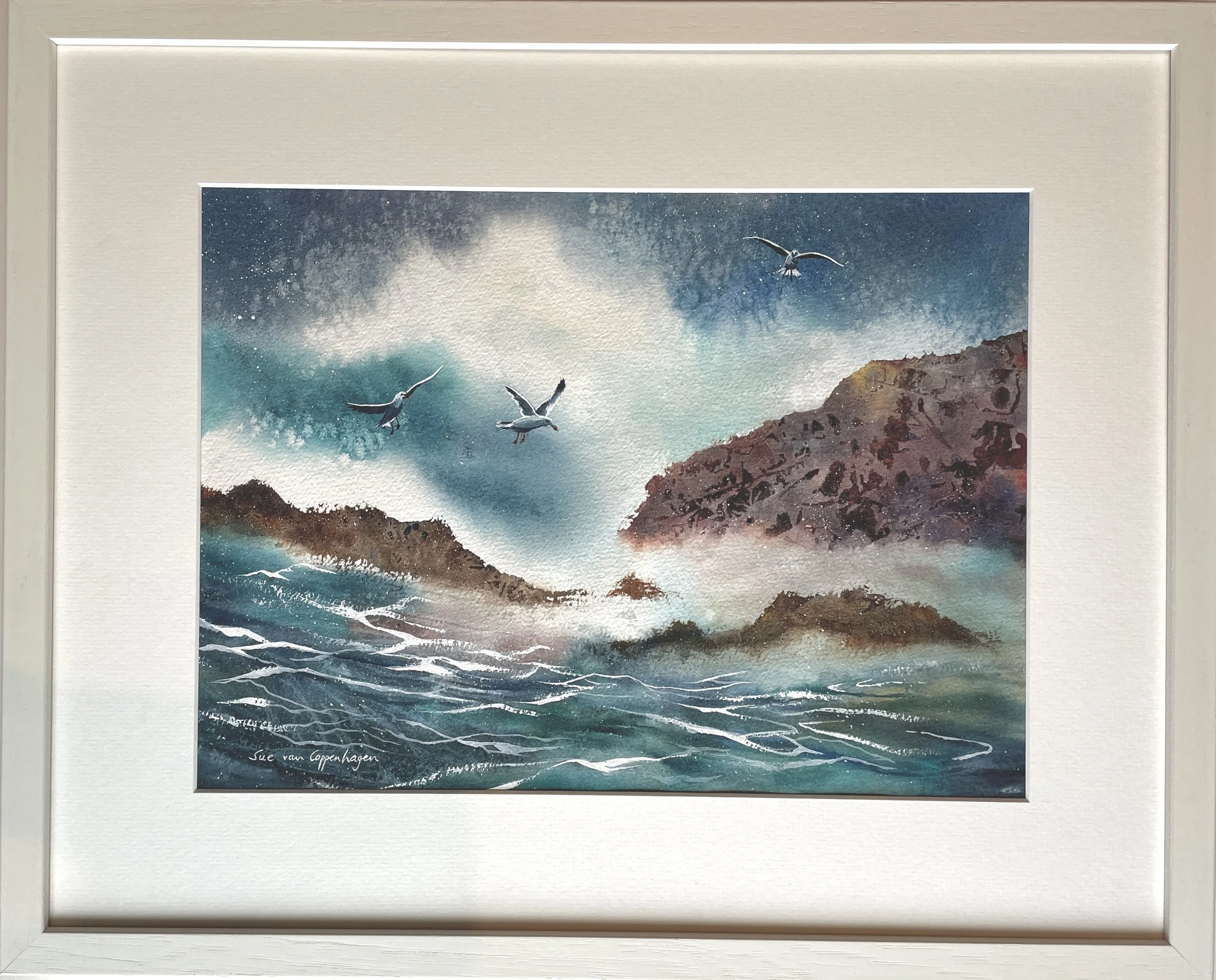 Framed watercolour seascape with dramatic spray, rocks and wheeling seabirds
