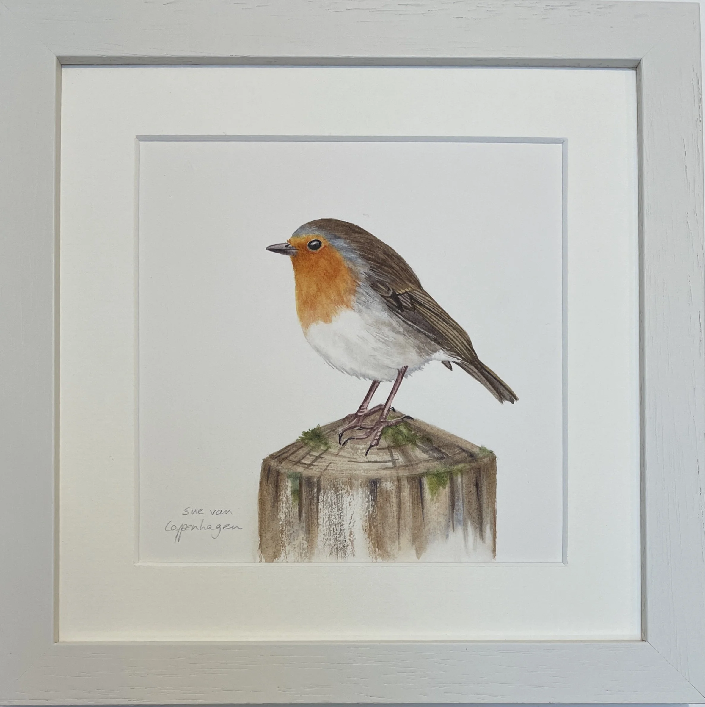 Framed painting of a robin bird posed on a wooden pole