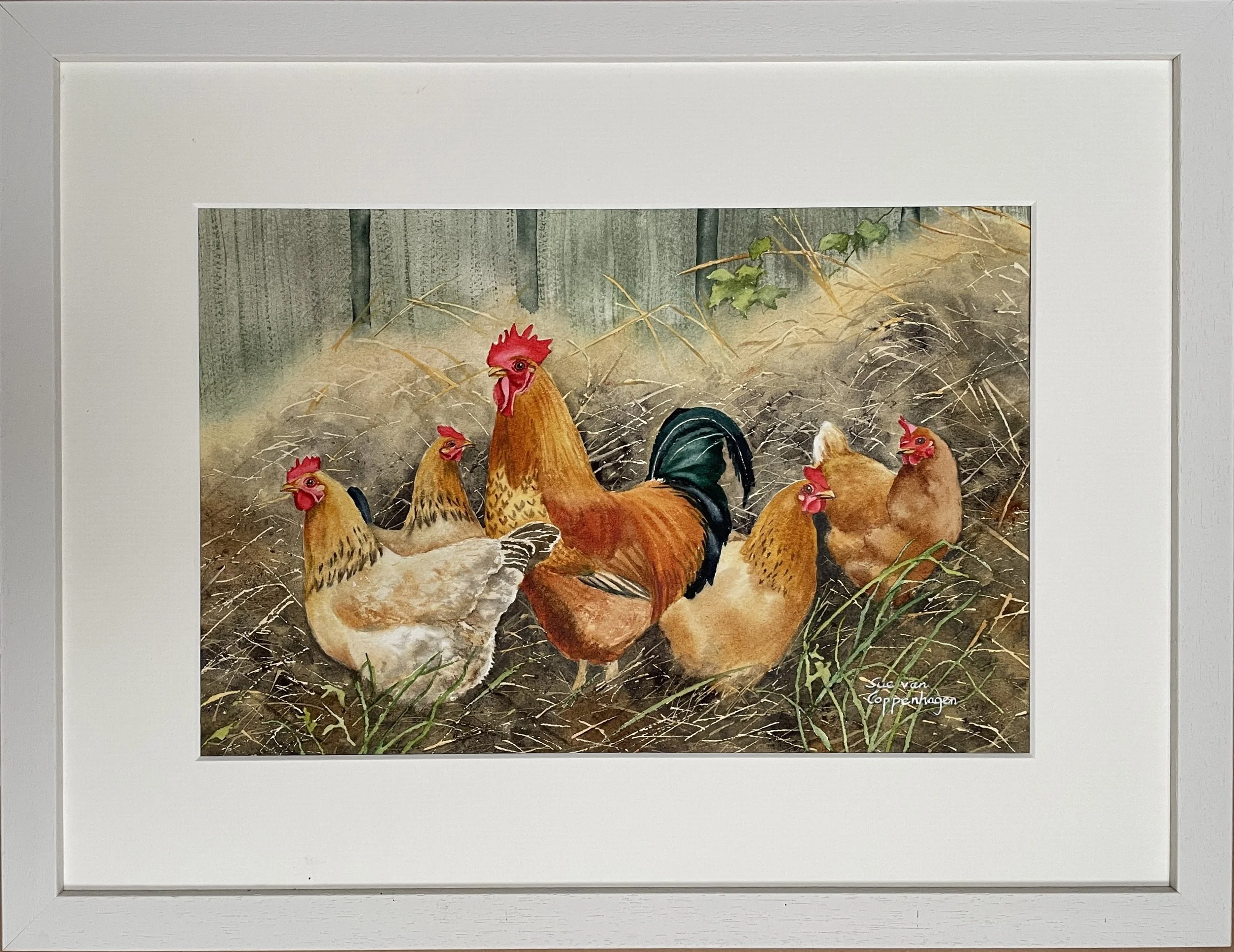 painting of four brown hens and a colourful rooster in a mound of pale gold straw in front of weathered timber panels; framed in an off-white wooden frame