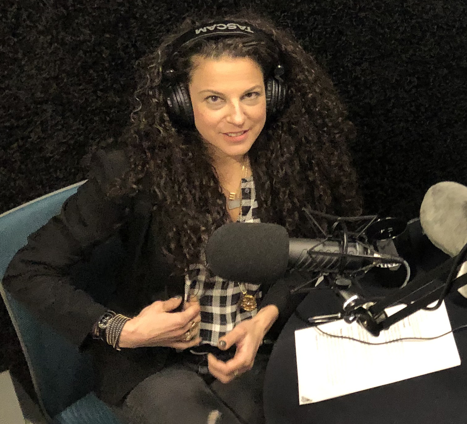 Emily Podcasting 2cropped.jpg