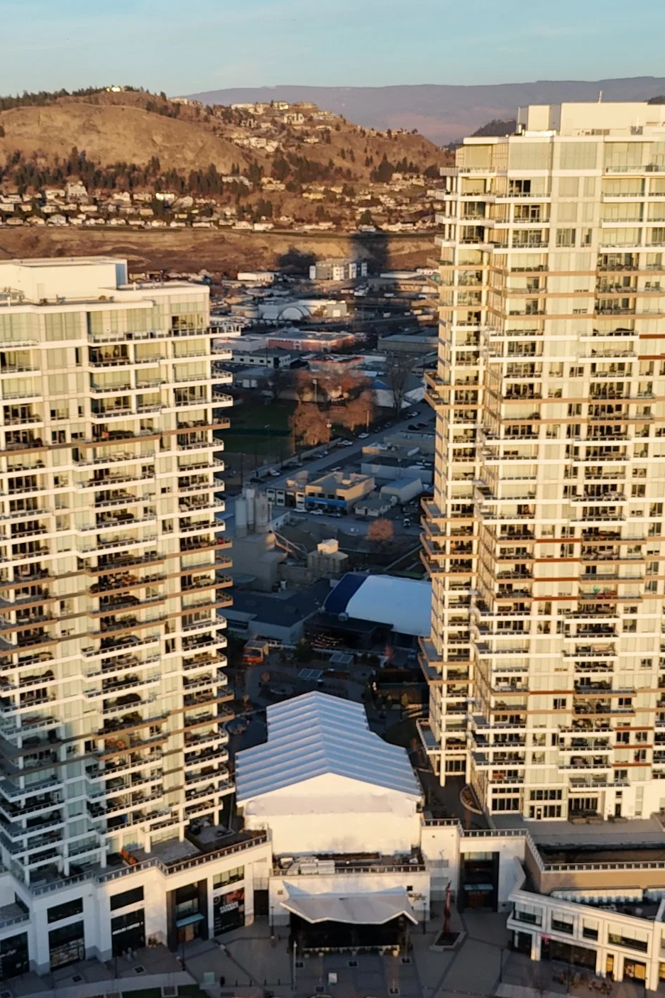 Hex Scaffolding Inc. installed a Keder Temporary Roof System over the One Water Street courtyard in Kelowna, BC, providing weather protection for commercial construction.
