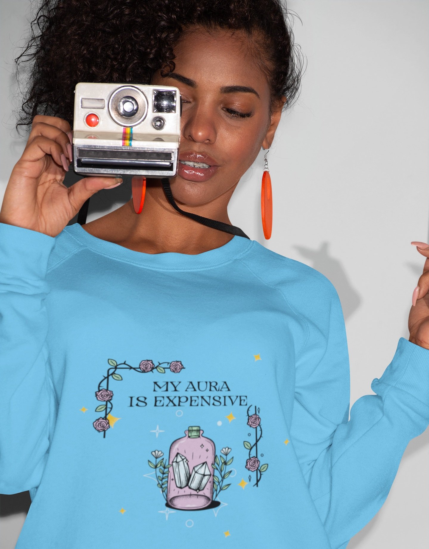crewneck-sweatshirt-mockup-of-a-girl-holding-a-retro-instant-camera-21910+%281%29.jpg