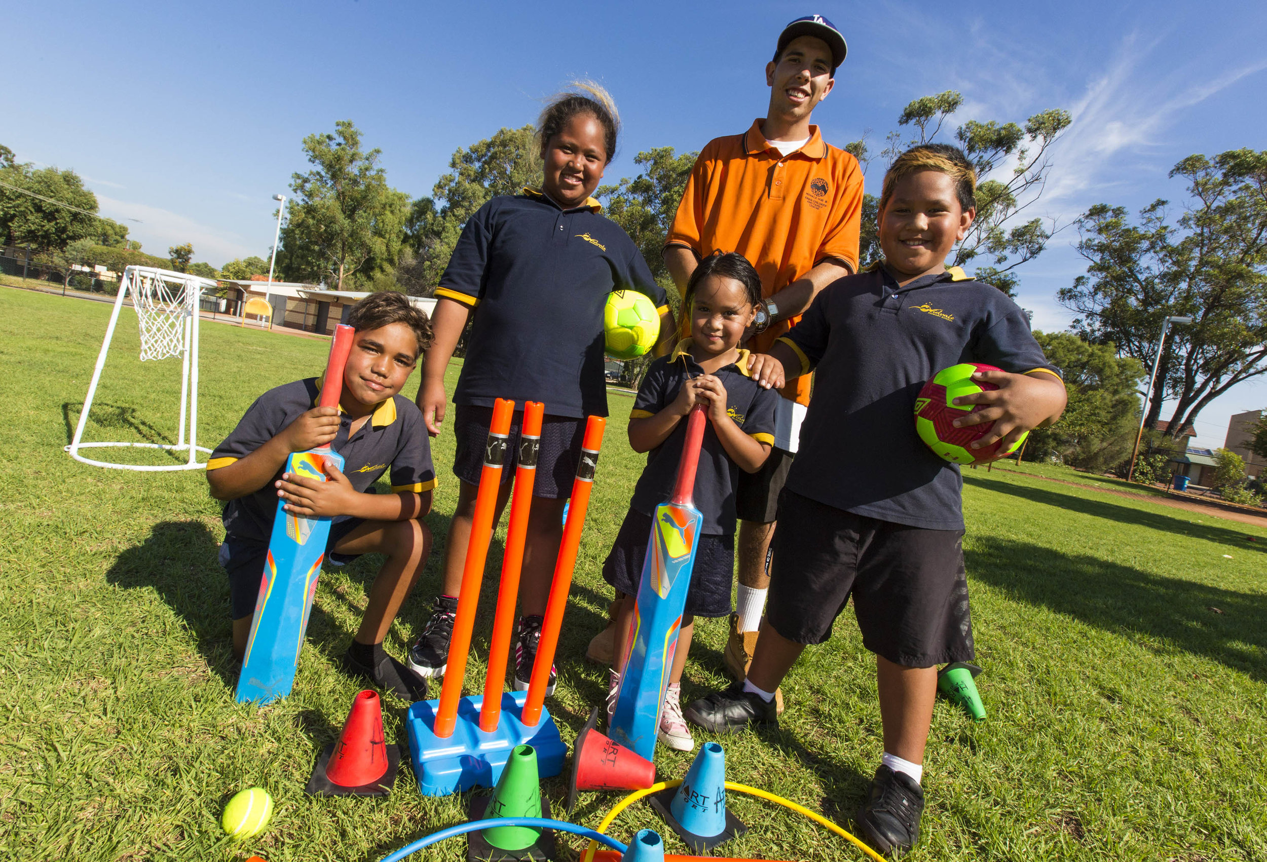 kids playing with sporting equipment