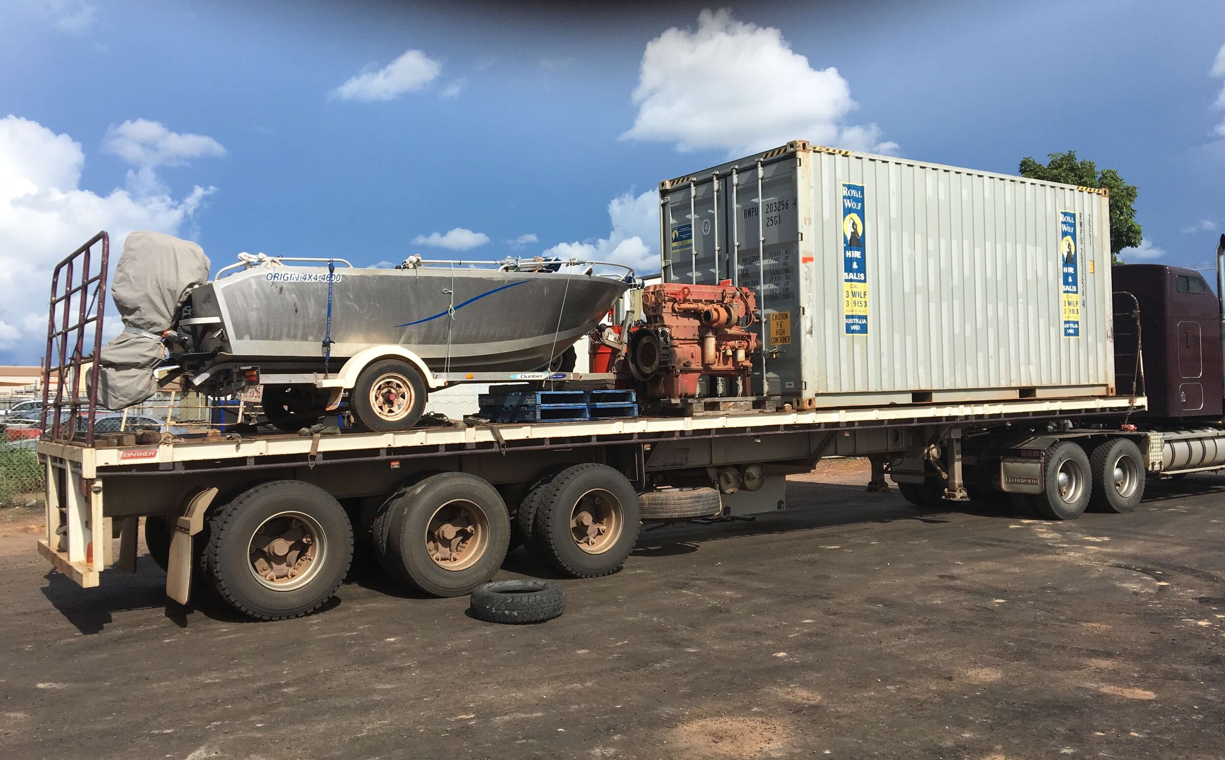 Dist Direct 2017 Boat and Container open flatbed.JPG