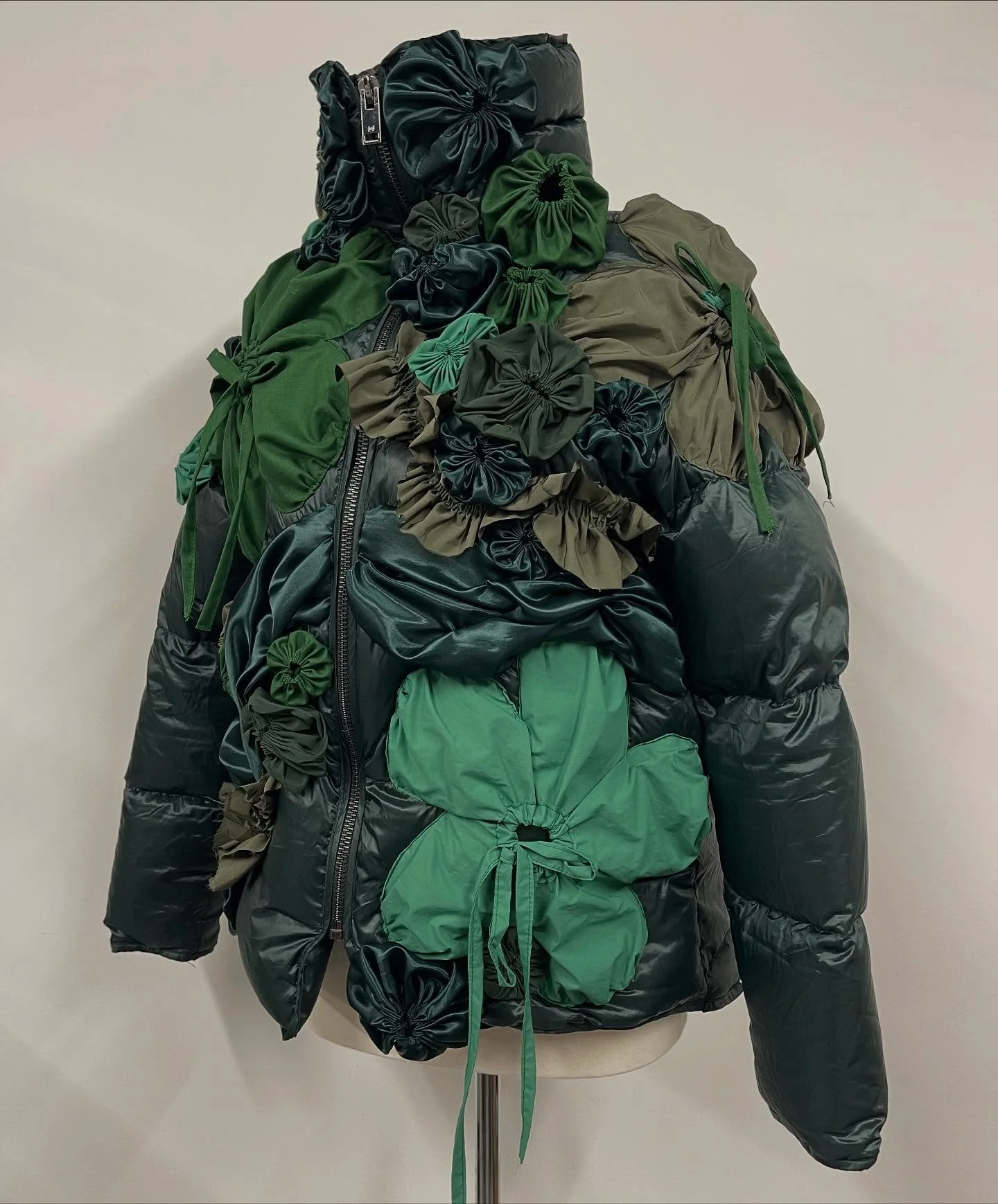 The bug coat!! Inspired by Marlene Huissod&rsquo;s chair at the @designmuseum and exploring what items would look like if they were designed for insects rather than humans 🪰 

I hand made a mix of Suffolk puffs and gathered flowers, frills and drapp