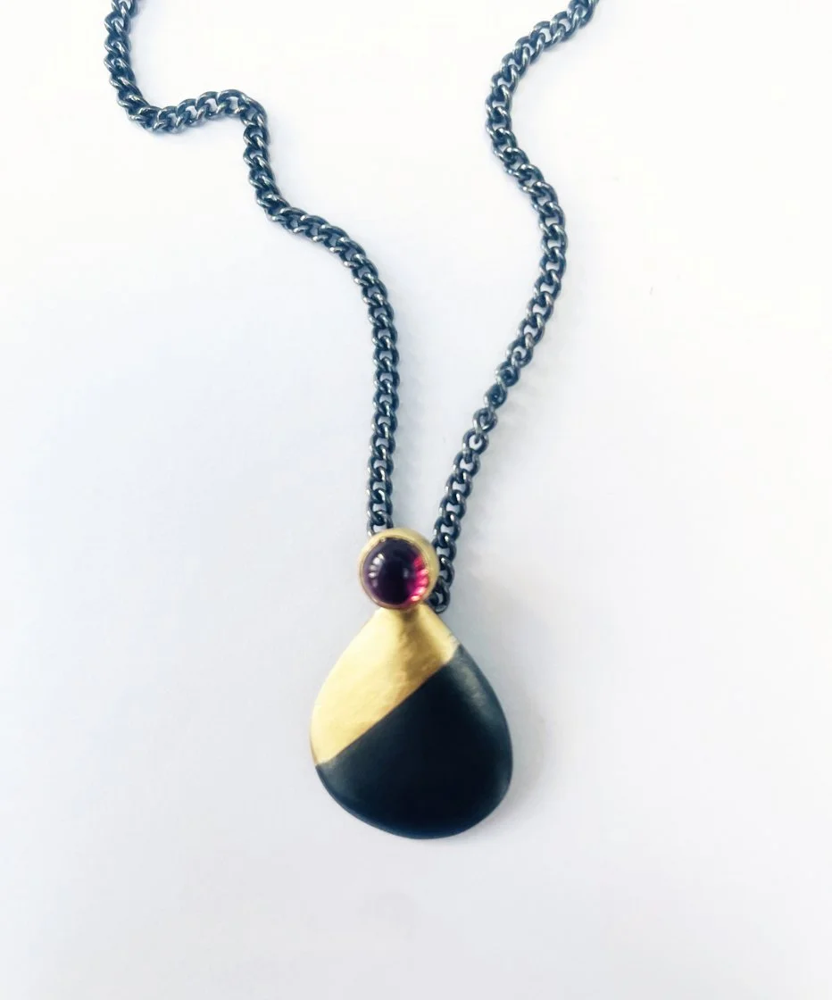 Teardrop pendant with garnet