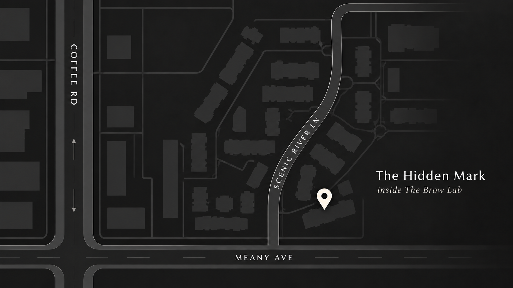 Map showing the location of 'The Hidden Mark' inside The Brow Lab. Streets labeled are 'Coffee Rd' to the west, 'Meany Ave' to the south, and 'Scenic River Ln' curving through the area. The map features dark background with lighter building outlines and street names, and a location marker indicating the site.