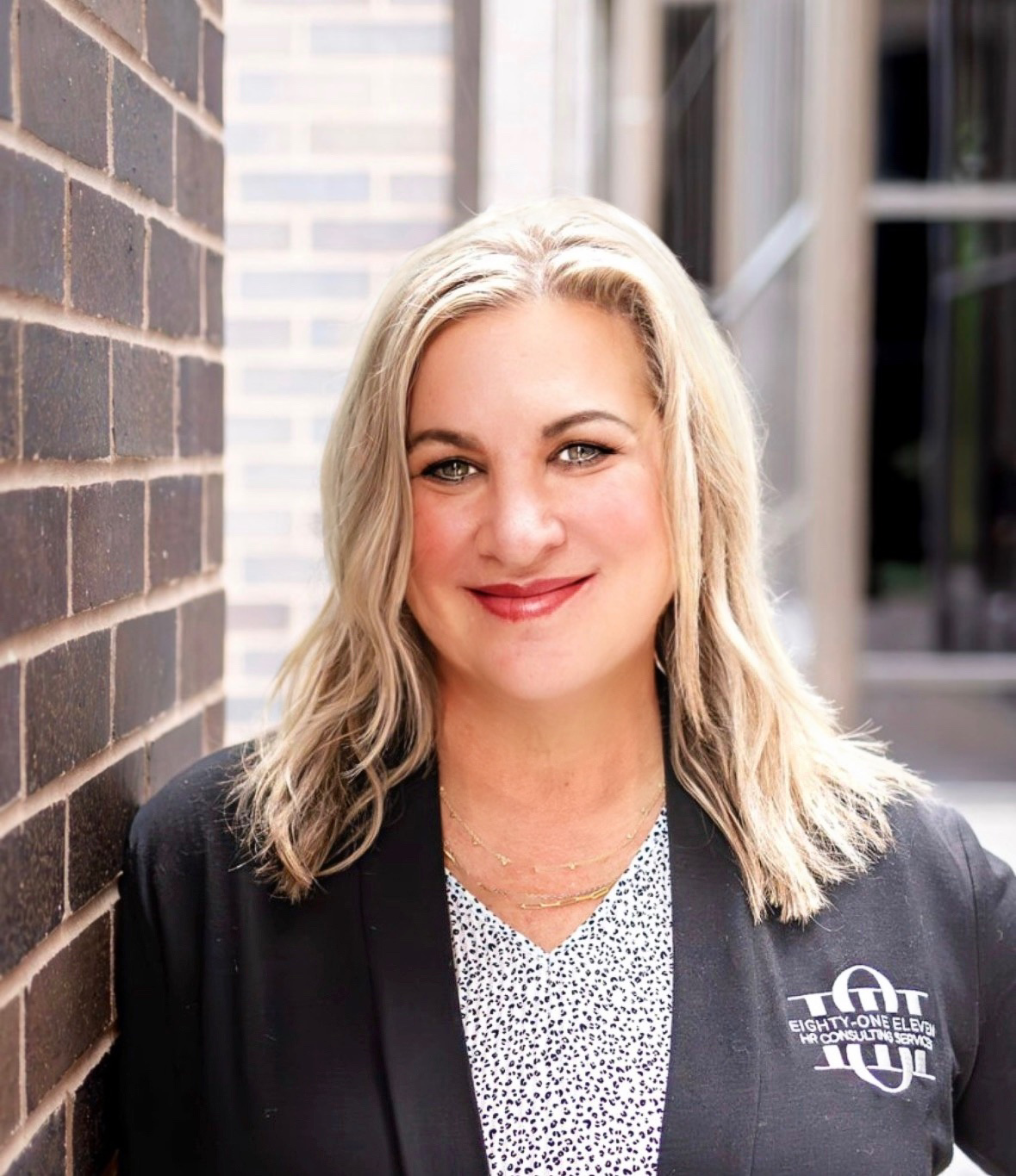 headshot of eighty one eleven gwen sirna