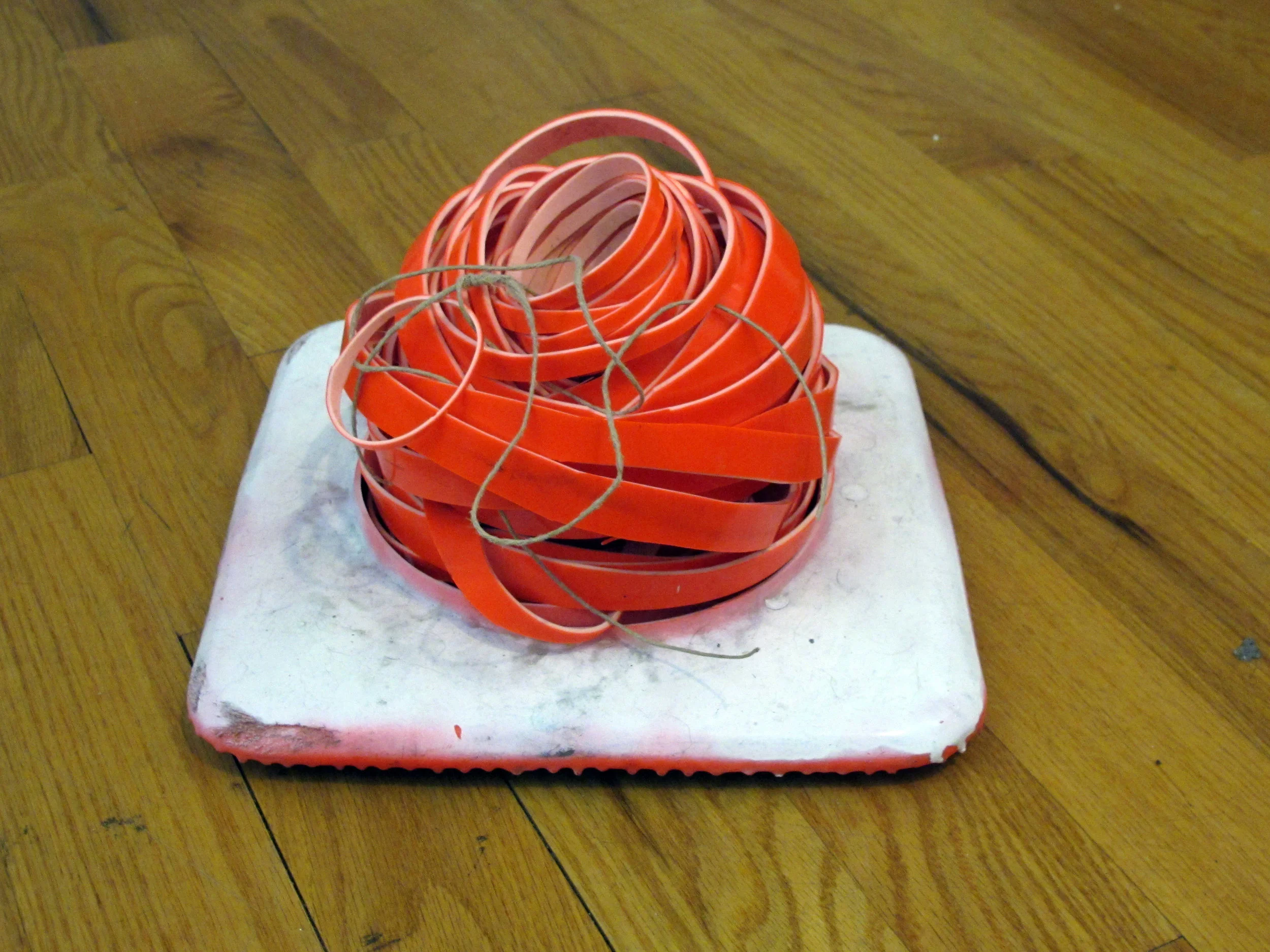 The Isolate , 2017 Traffic cone, spray paint, hemp string 7 x 11 x 11 inches