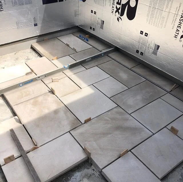 Making our own irregular lime stone Pieces out of our own custom made track saw. New patio has a seamless slot drain on one end coming out real great!