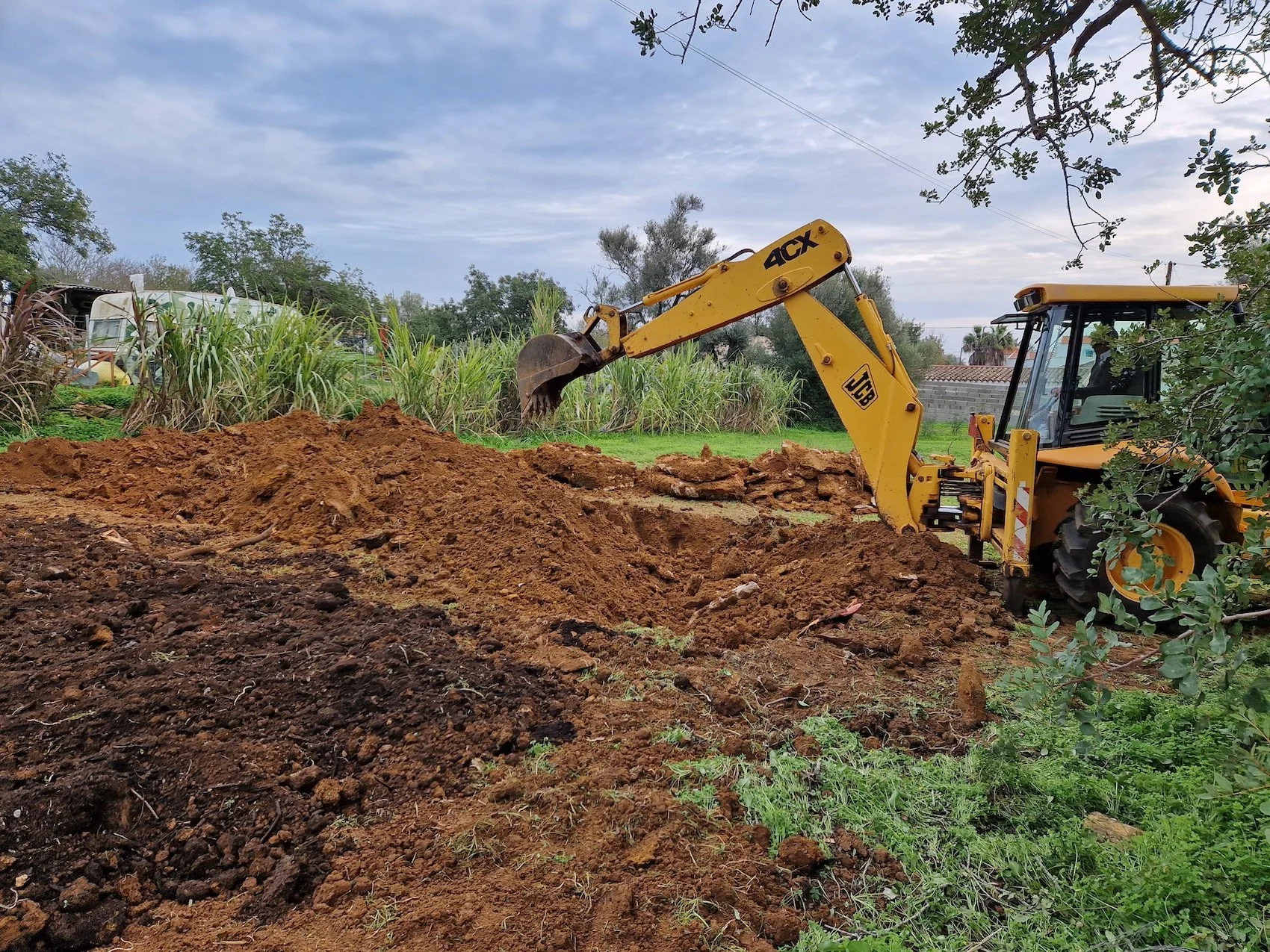 Dry Orchard Experiment - Bulldozer machine digging