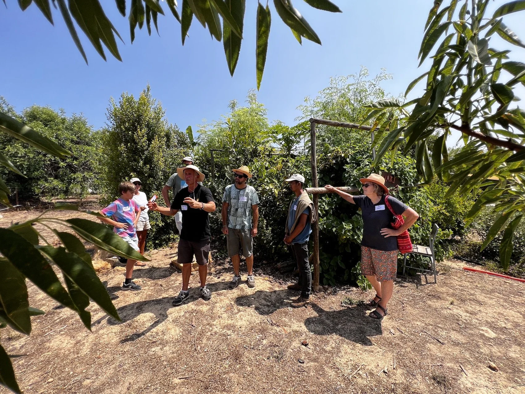 Miguel Cotton leading a tour of the garden
