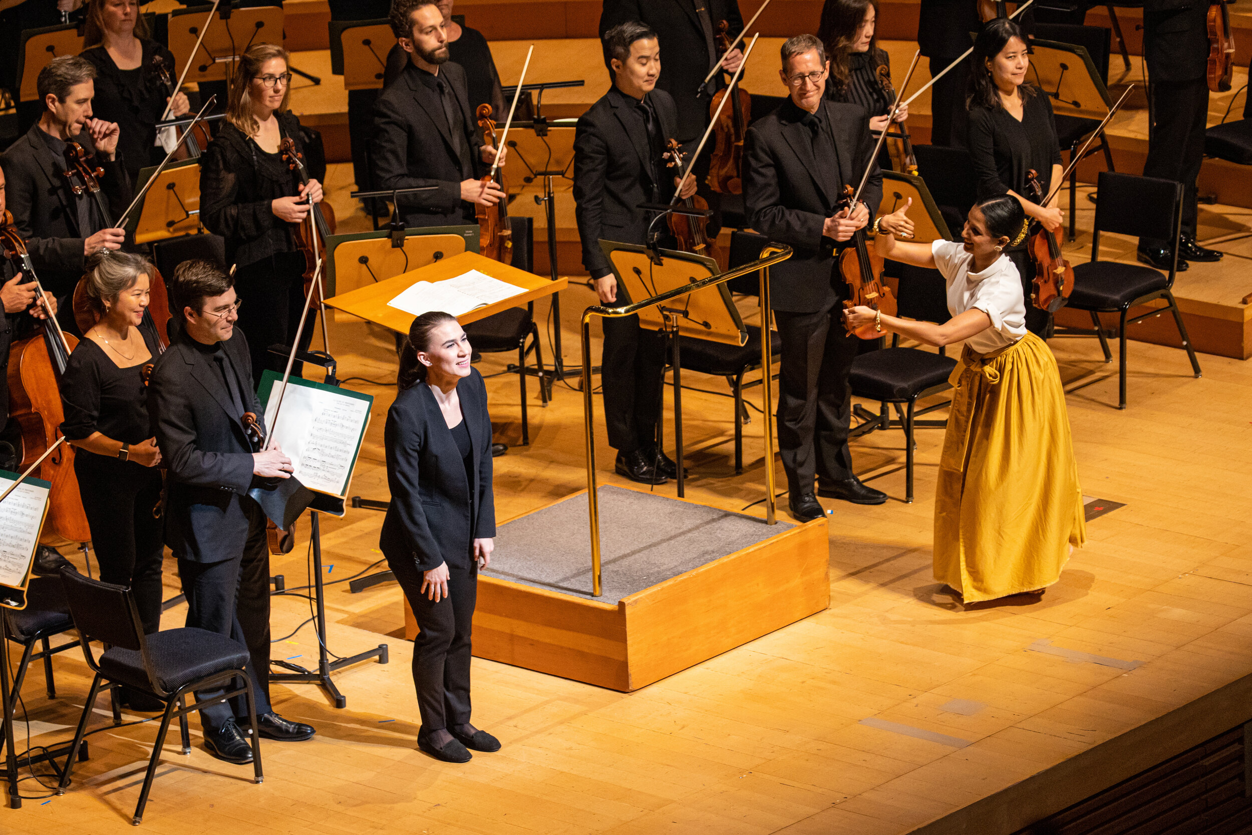 Pictured Bhavana is inviting the Polish Conductor Martha Gordolinsky 