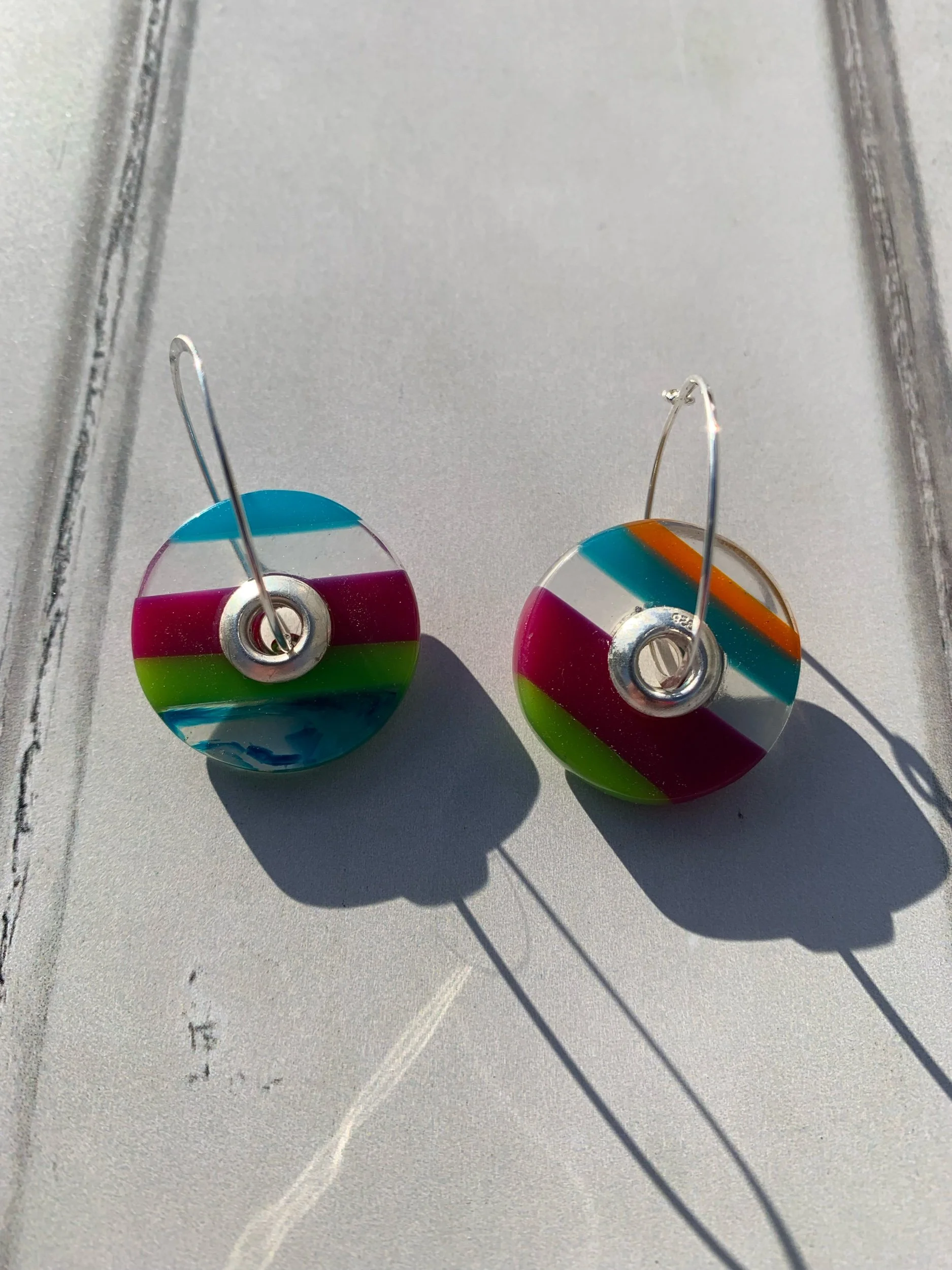 Hand carve resin spinner earring’s made from recycled resin