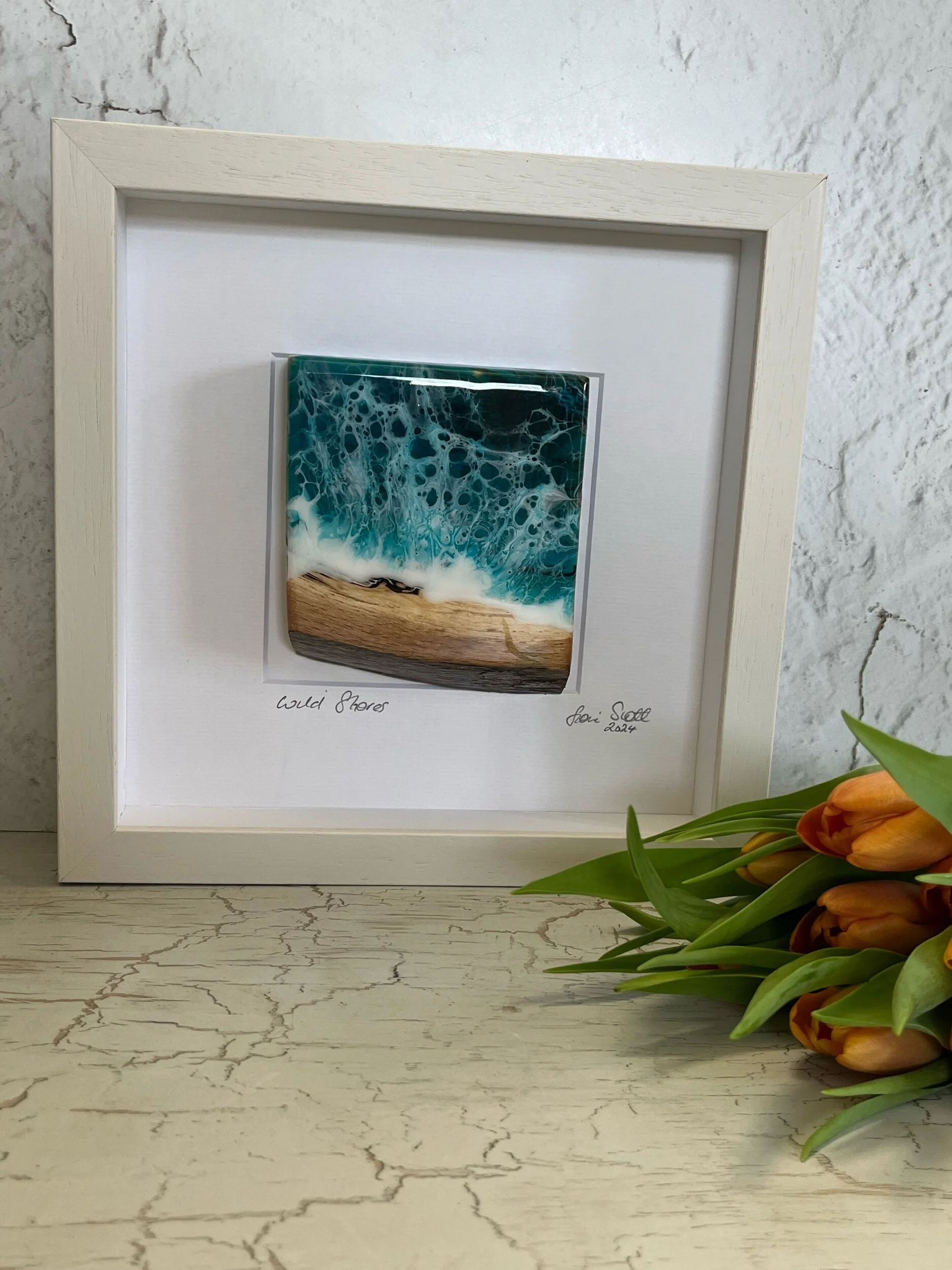 Natural wood slice and ocean inspired resin framed art