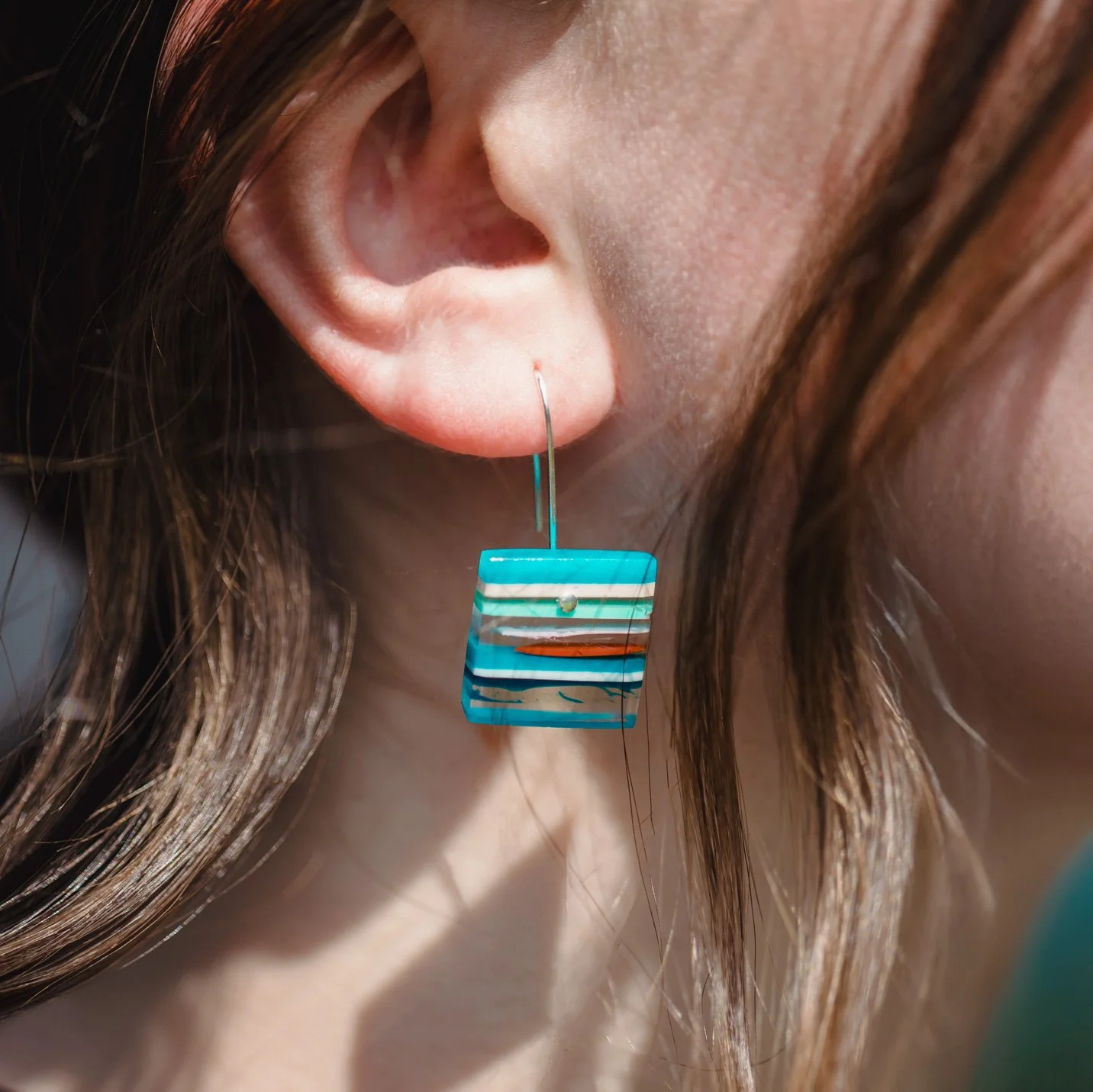 square cut dangle earrings made by fiona scott resin artist from recycled resin