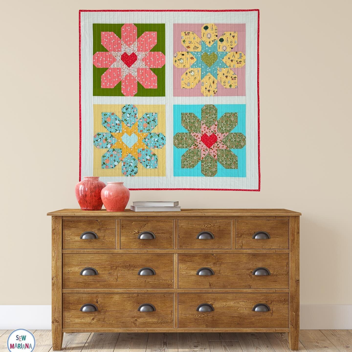 Flower Love is a simple quilt that just brightens up any room it&rsquo;s in; the flowers are three toned, the centers are cute little hearts, and if you want to give it a pop art sort of feeling, you can do what I did with this one and give each flow