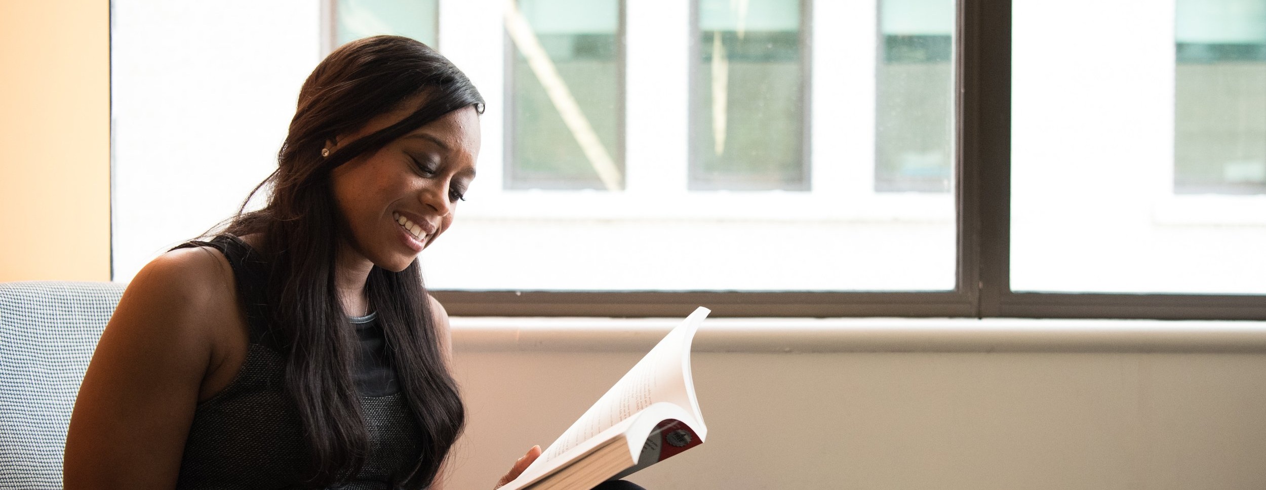womanreadinglibrary.jpg
