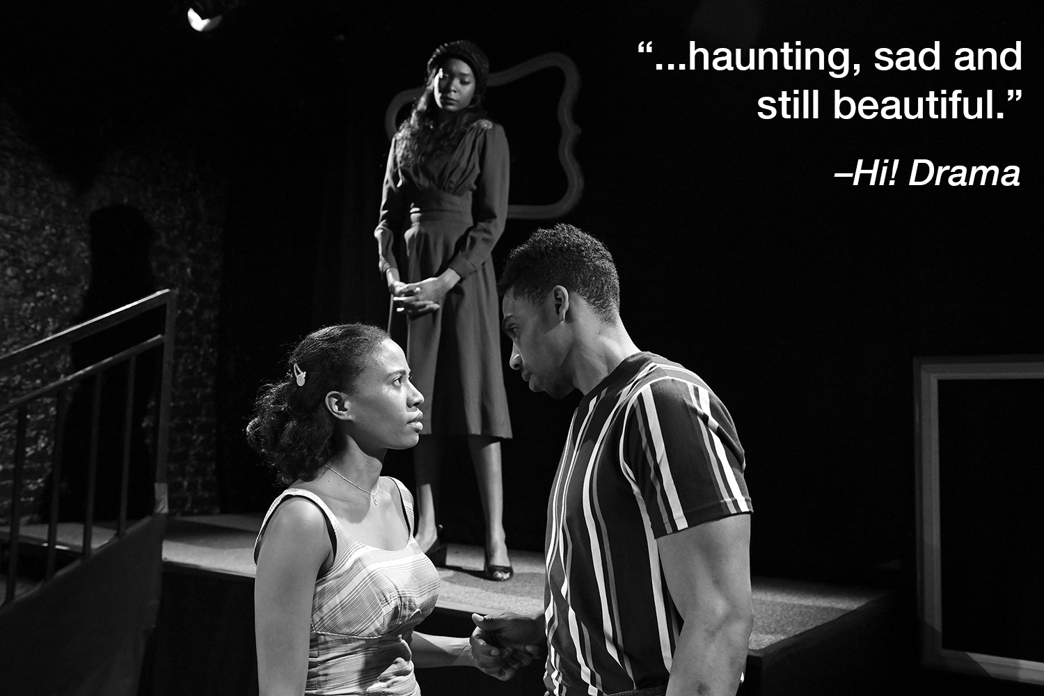  Ashley Noel Jones (Alma Jean Pierson), and Anthony Goss (Ray Johnson), have an intimate conversation in a scene from  Mirrors . Kayland Jordan (Annabelle “Belle” Pierson) watches from behind. Photo by John Quilty.  A quote in white text reads “…haun