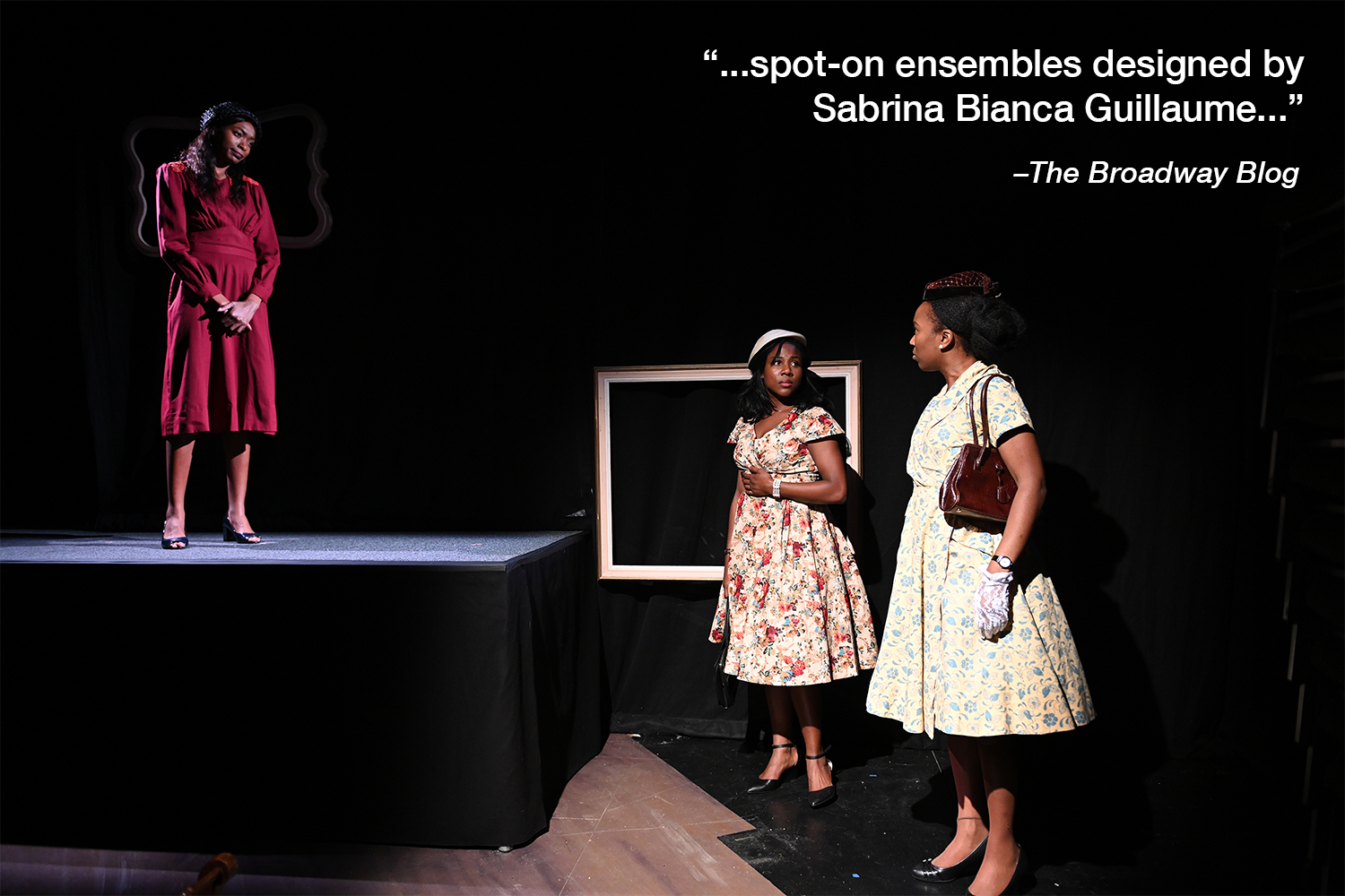  Kayland Jordan (Annabelle “Belle” Pierson) watches as Natalie Jacobs (Constance Jenkins) and AnJu Hyppolite (Mabel Mosley) stand in front of Bird’s house, in a scene from  Mirrors . Photo by John Quilty.  A quote in white text reads “…spot on ensemb