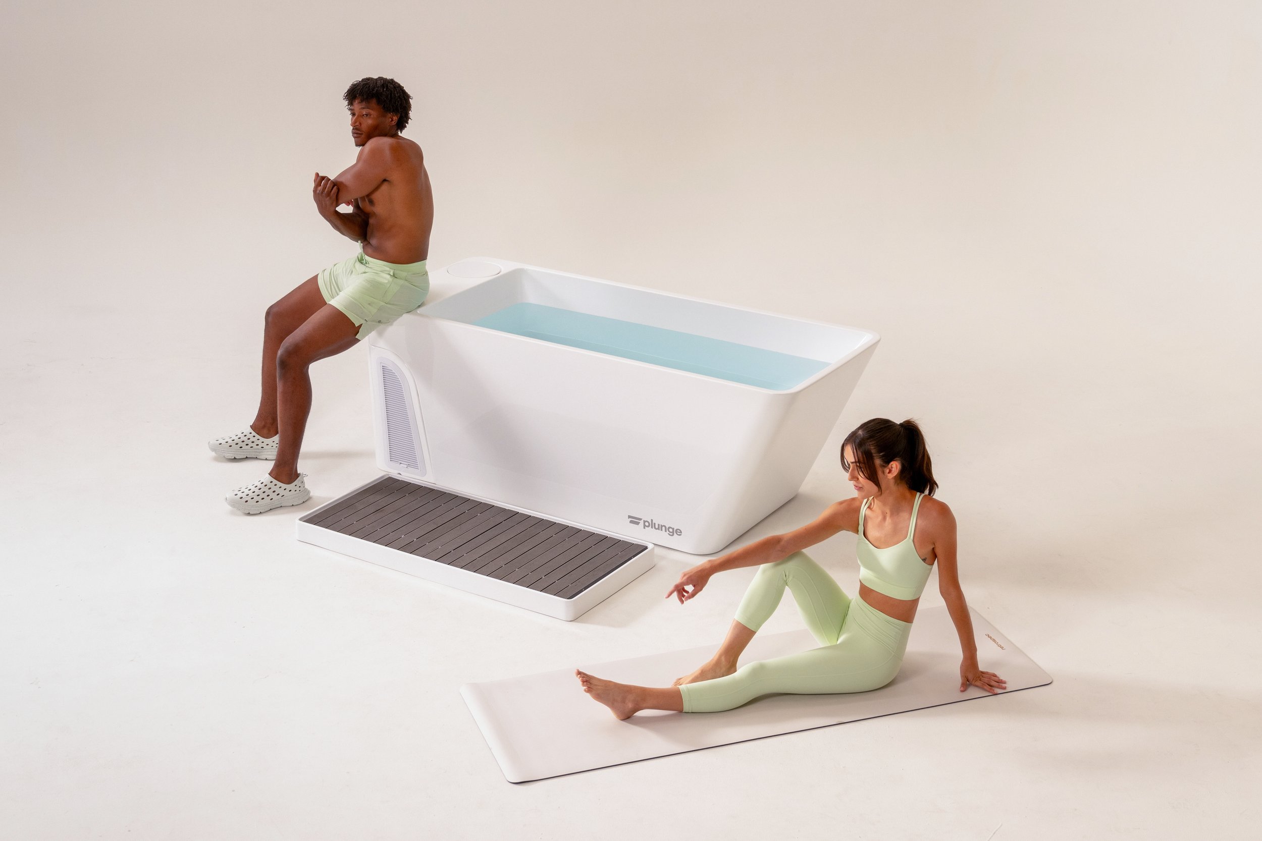man and woman on yoga mats.jpg