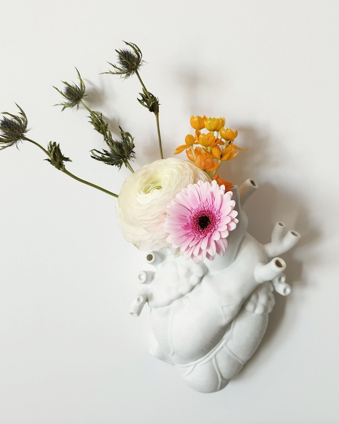 . I just wanted to remind you to bring some fresh flowers into your home and have some fun experimenting with different ways to display them. 

Do you buy yourself flowers?  Why not create a collection of your favorite vases and choose some flowers t