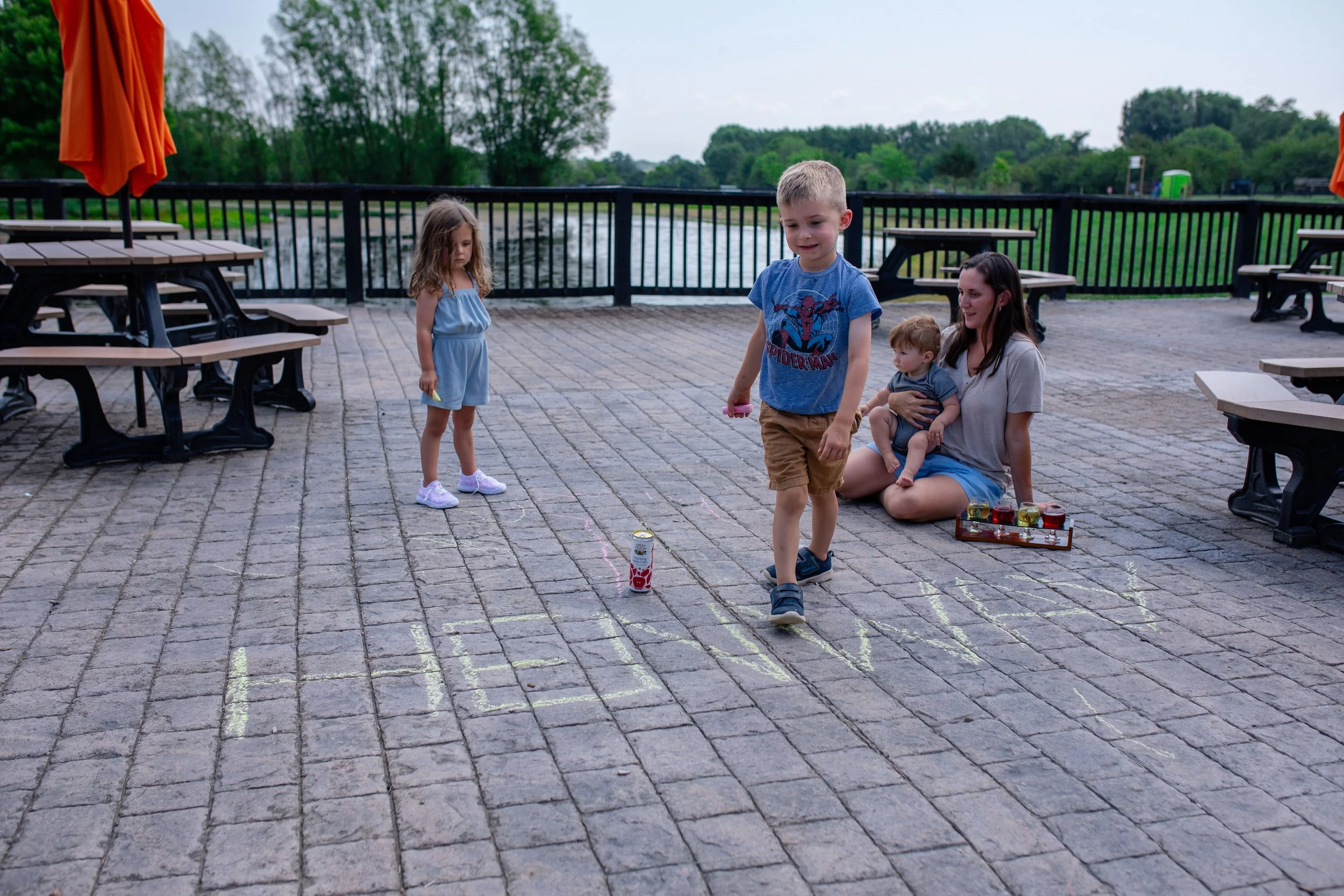 Henway Patio Pond in Background Kids Nicole.jpeg