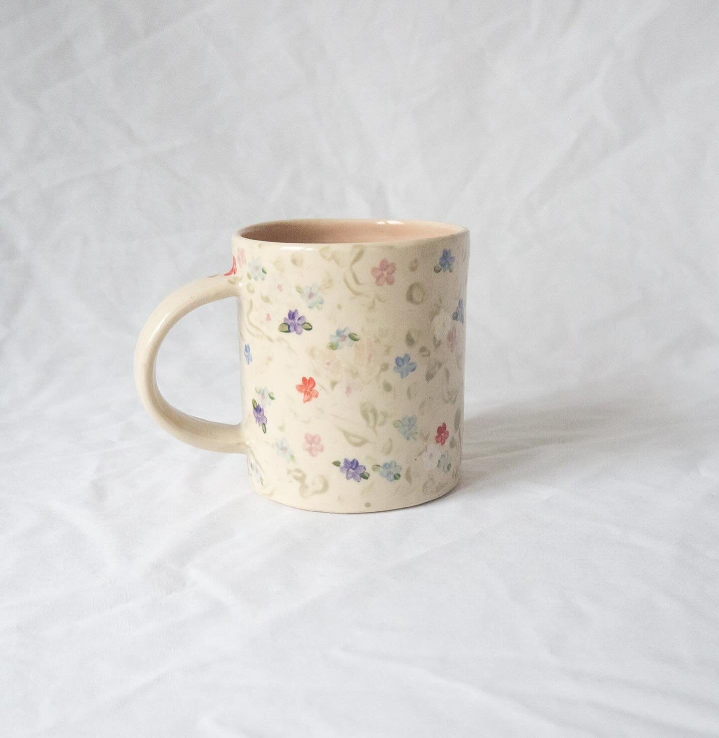 Watching flowers bloom, thinking up mugs for your cabinet collection