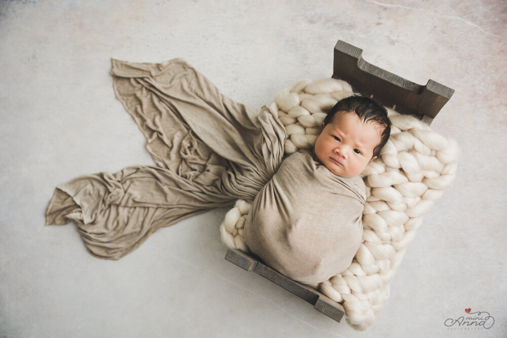 newborn baby in studio portrait