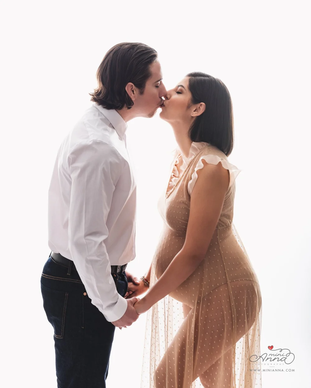 Marin studio maternity portrait featuring classic posing and neutral tones