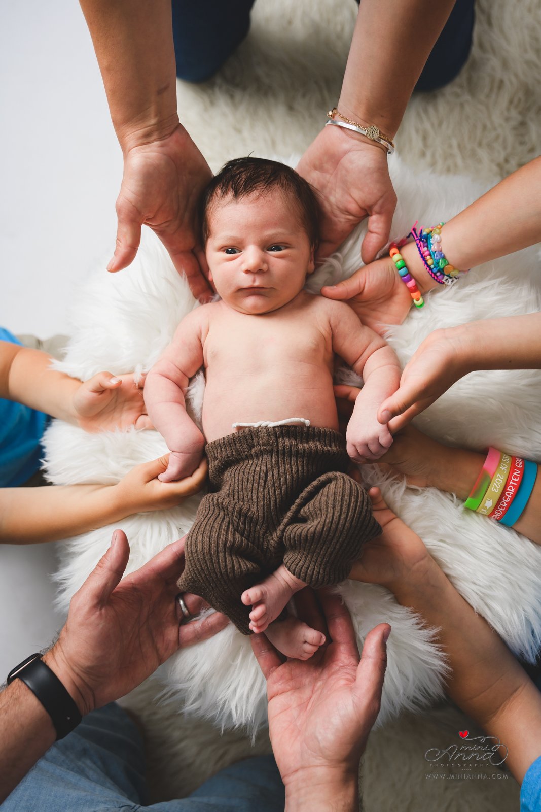 Newborn portrait with family