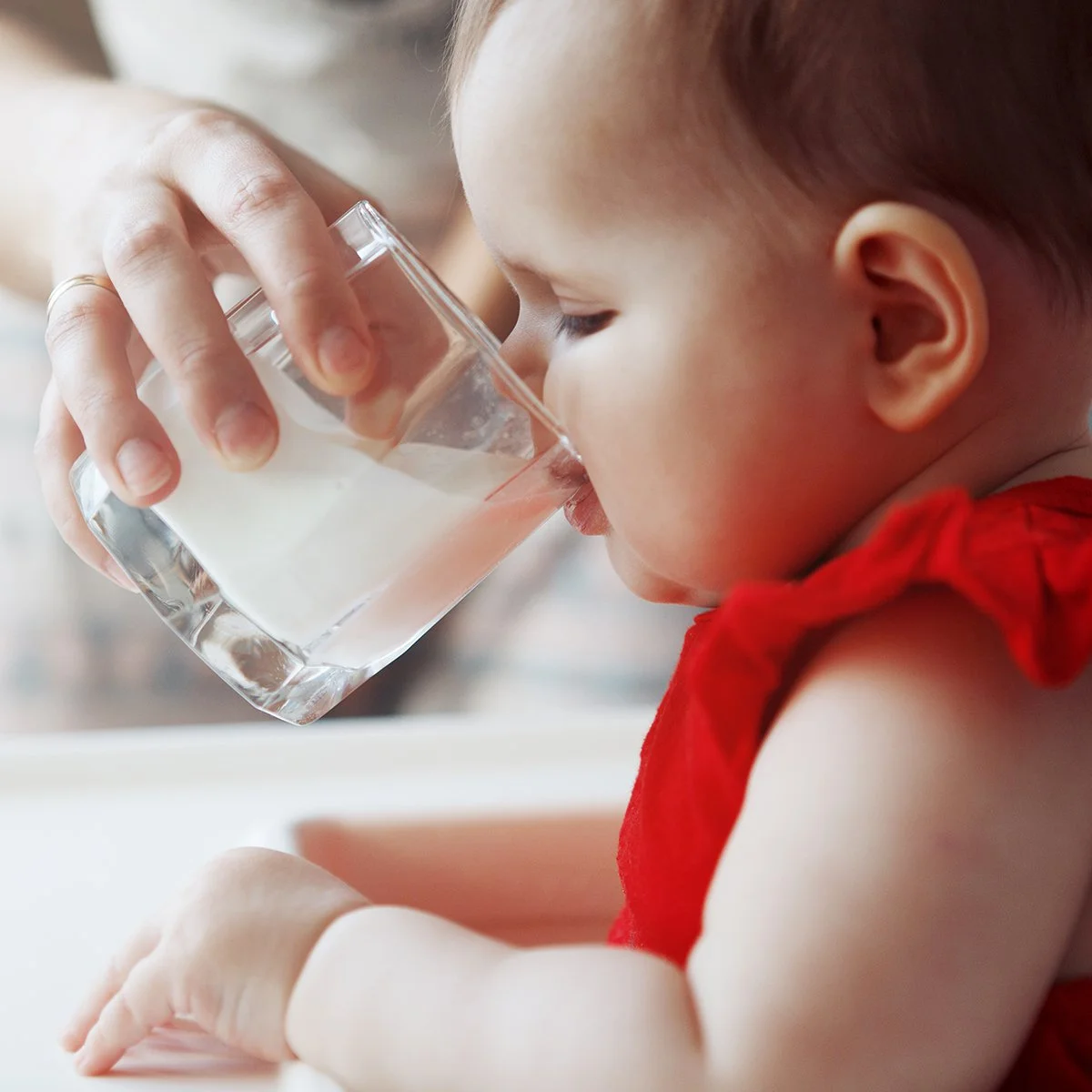cute-baby-red-dress-puffy-cheeks-shutterstock_1048389592.jpg