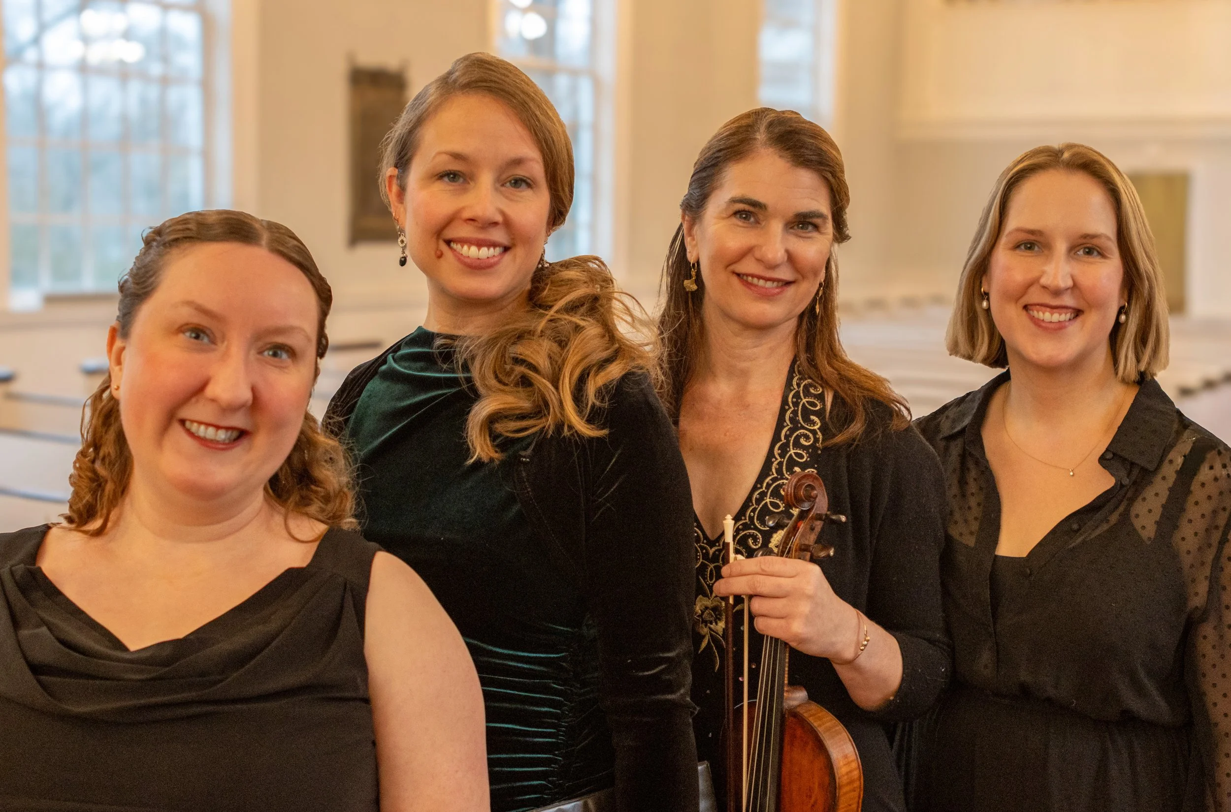 A headshot of 4 Early Music female musicians