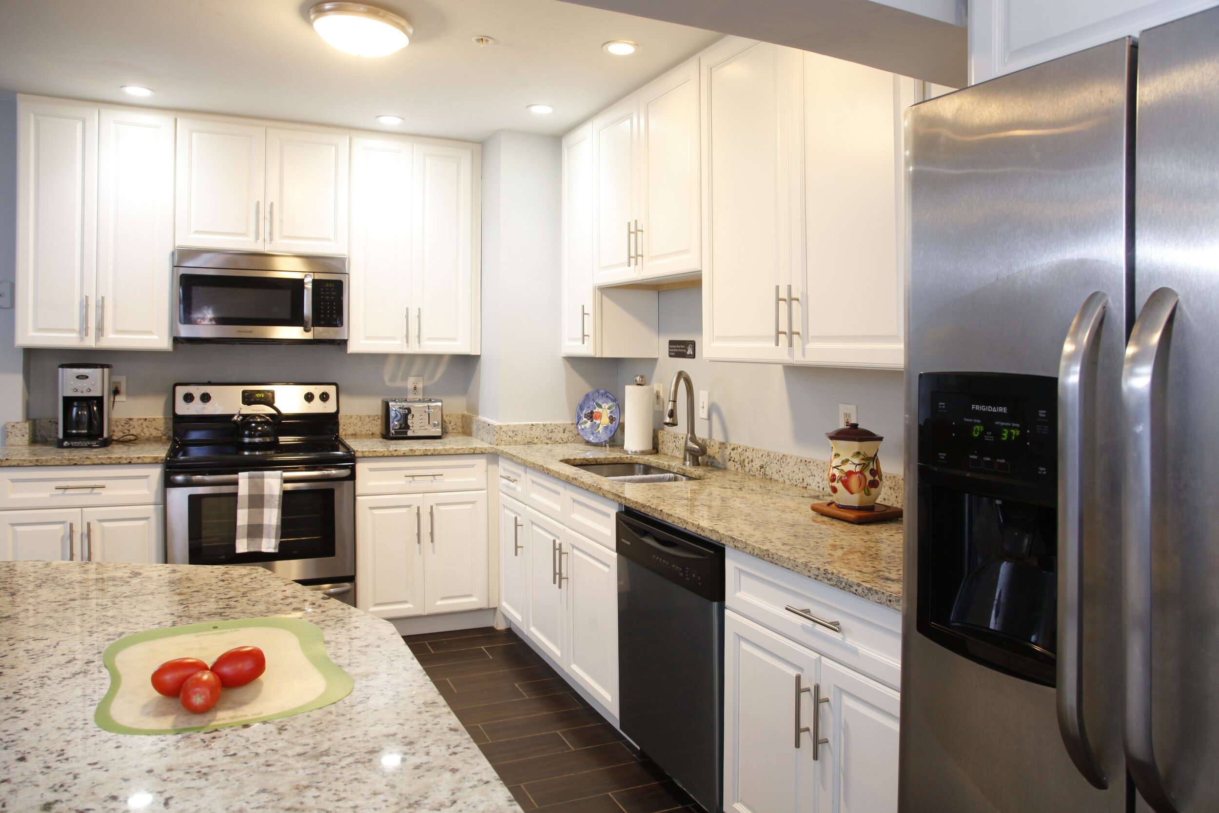  Featuring stainless steel appliances and granite counter tops, any meal cooked in this kitchen is sure to be divine! 