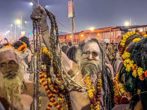 Sadhus marching towards the Sanga for the Royal Bath, Kumbh Mela, Prayagraj, India